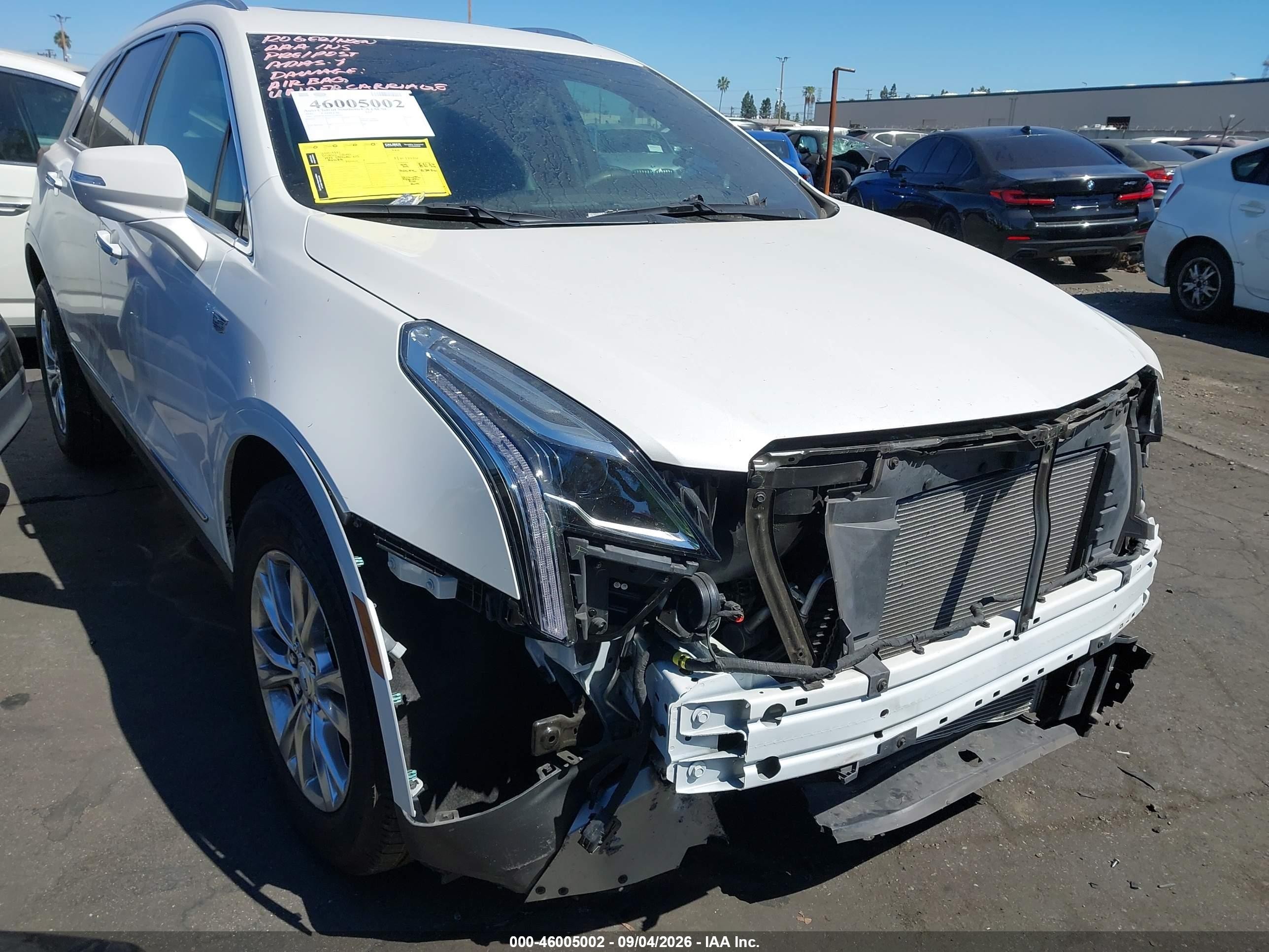 2020 Cadillac XT5 VIN 1GYKNCRSXLZ144701 IAAI salvage auction — Unknown, Salvage Certificate (California), sold $6,400 on 2026-09-19 (photo 1)