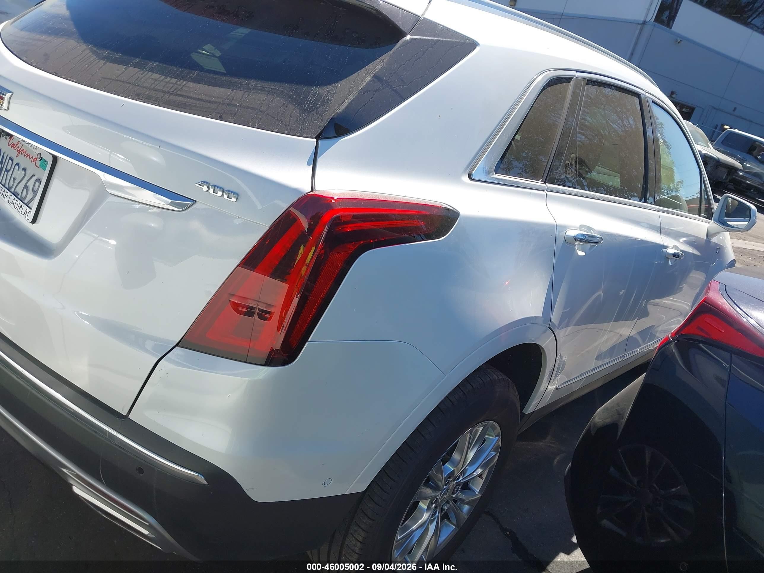 2020 Cadillac XT5 VIN 1GYKNCRSXLZ144701 IAAI salvage auction — Unknown, Salvage Certificate (California), sold $6,400 on 2026-09-19 (photo 4)