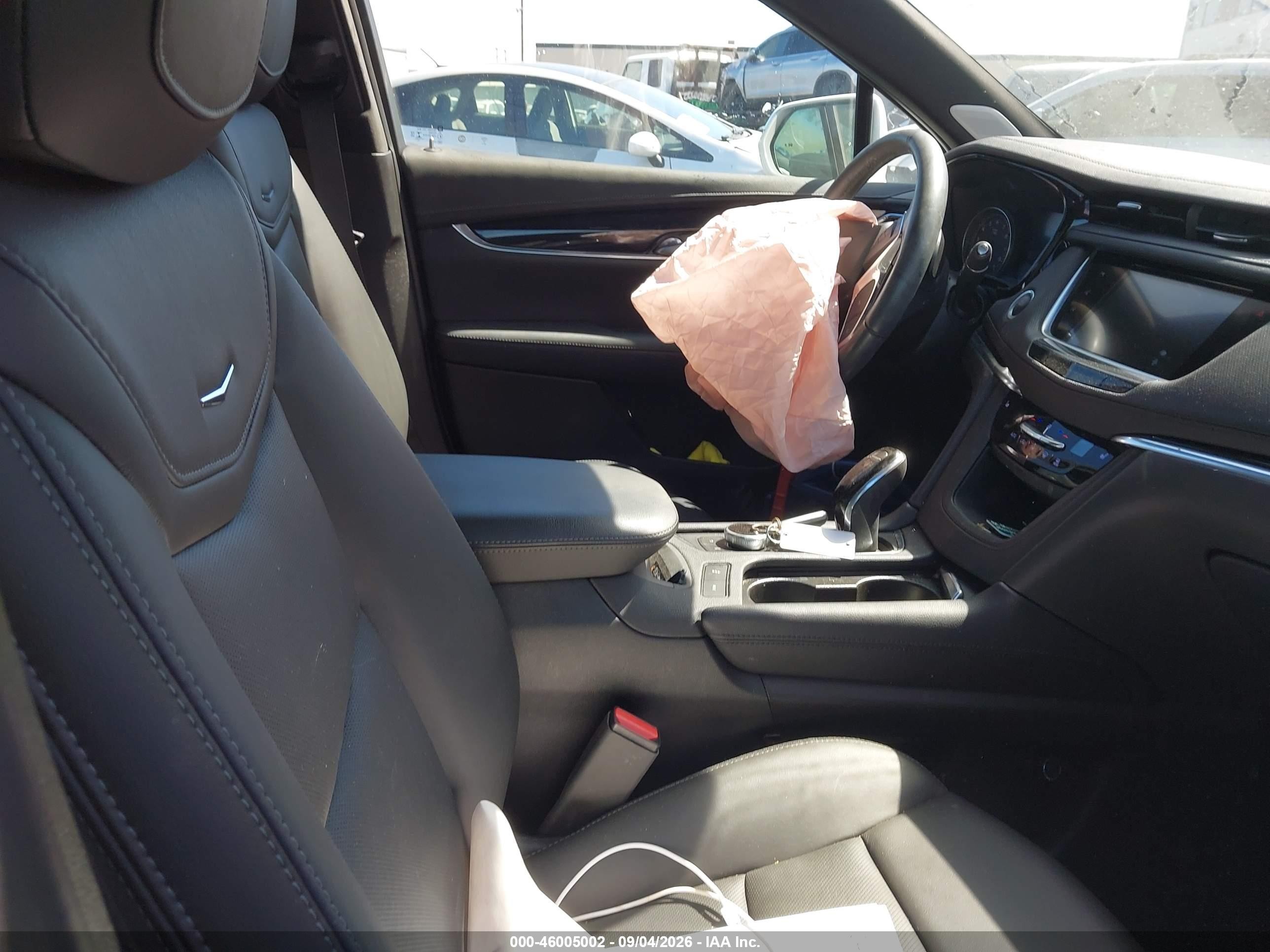 2020 Cadillac XT5 VIN 1GYKNCRSXLZ144701 IAAI salvage auction — Unknown, Salvage Certificate (California), sold $6,400 on 2026-09-19 (photo 5)