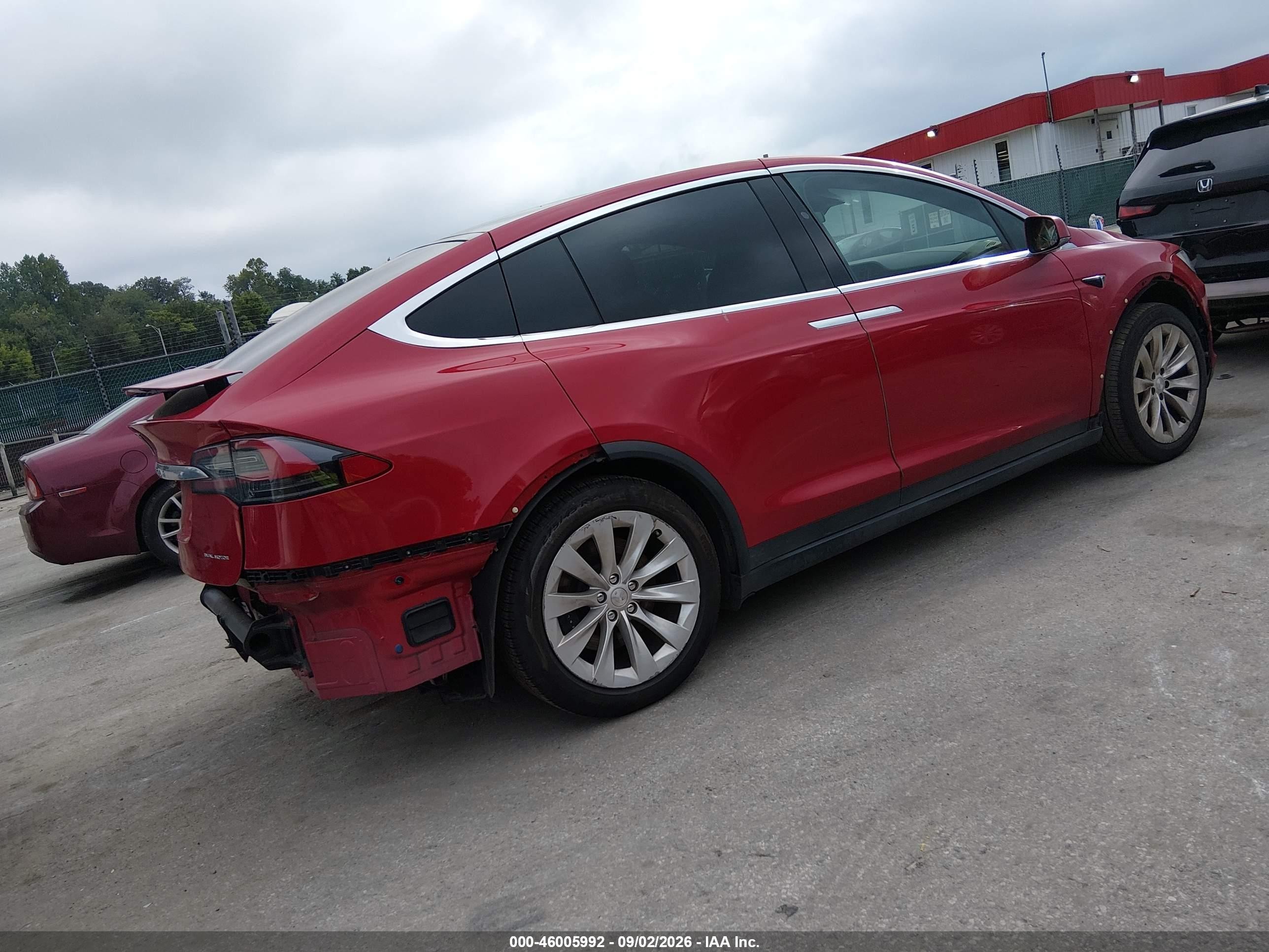 2020 Tesla Model x VIN 5YJXCDE24LF306793 IAAI salvage auction — Rear End, Salvage - Greater Than 75% (Maryland), sold $12,100 on 2026-09-18 (photo 4)
