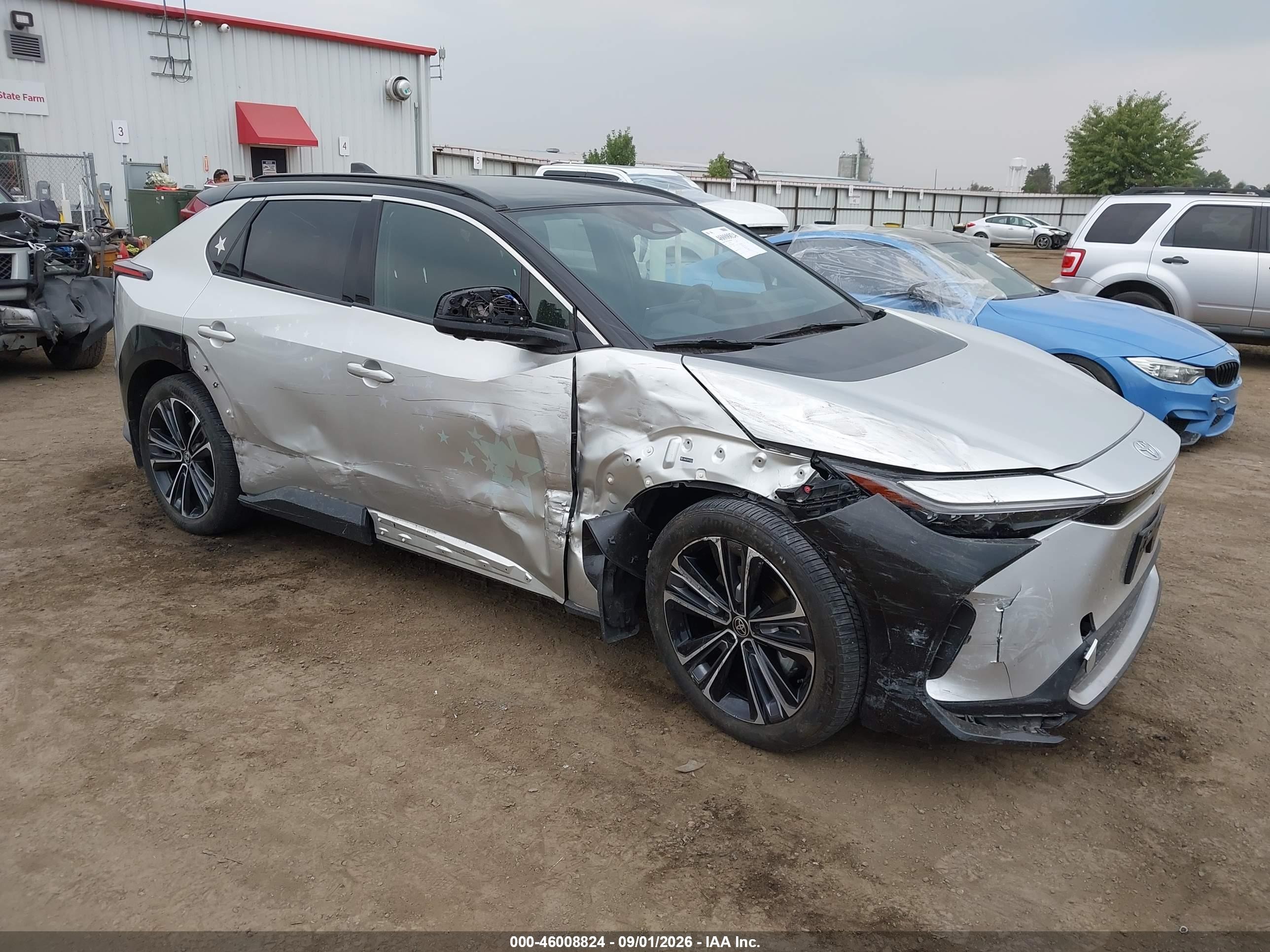 2023 Toyota BZ4X VIN JTMABACA5PA043049 — IAAI salvage auction photo