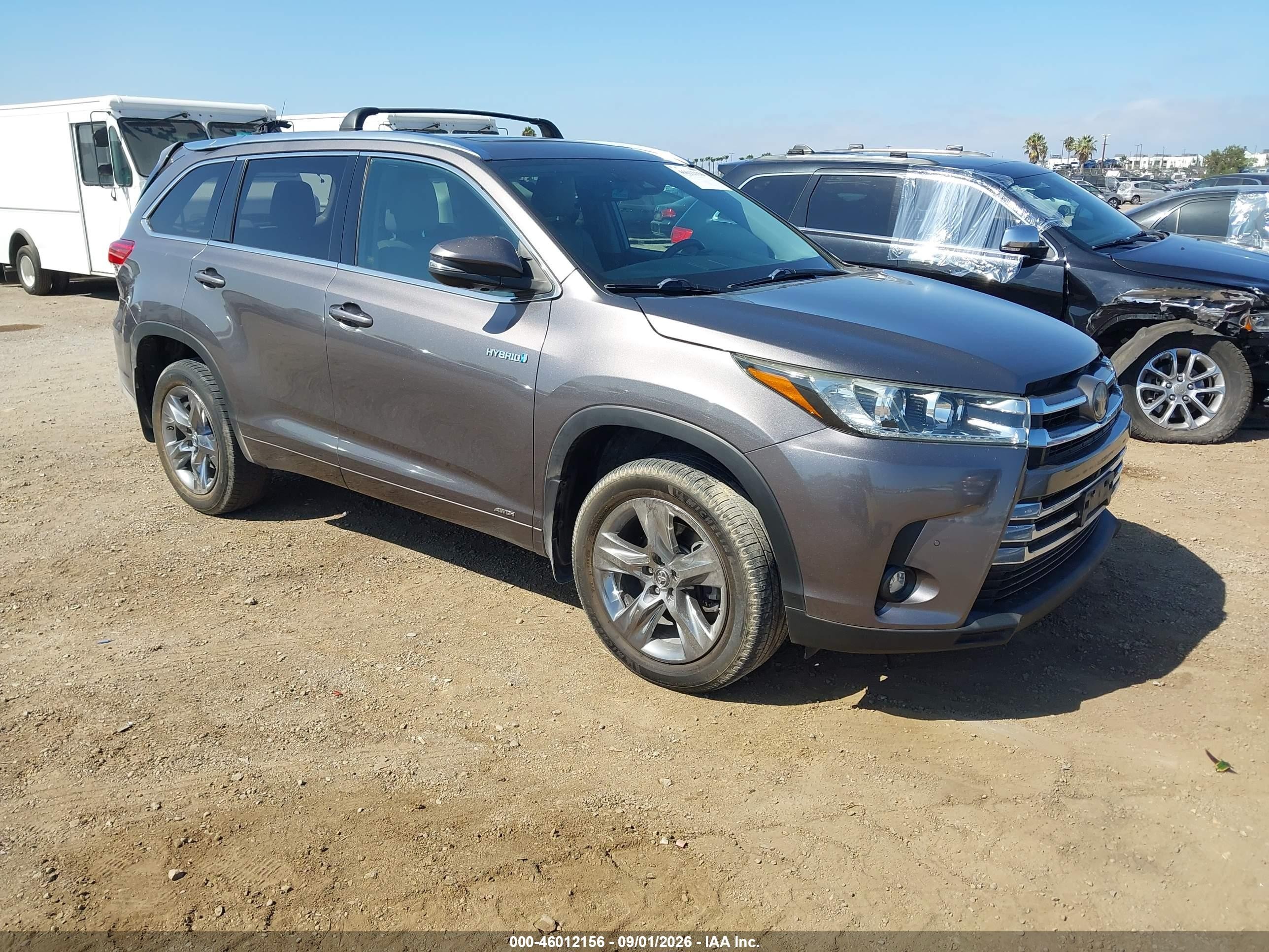 2019 Toyota Highlander Hybrid VIN 5TDDGRFH1KS063199 — IAAI salvage auction photo