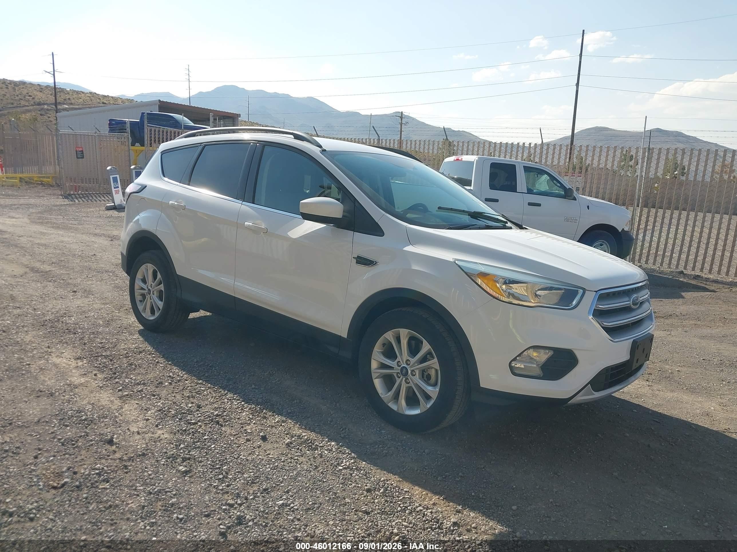 2018 Ford Escape VIN 1FMCU9GD7JUD08691 — IAAI salvage auction photo