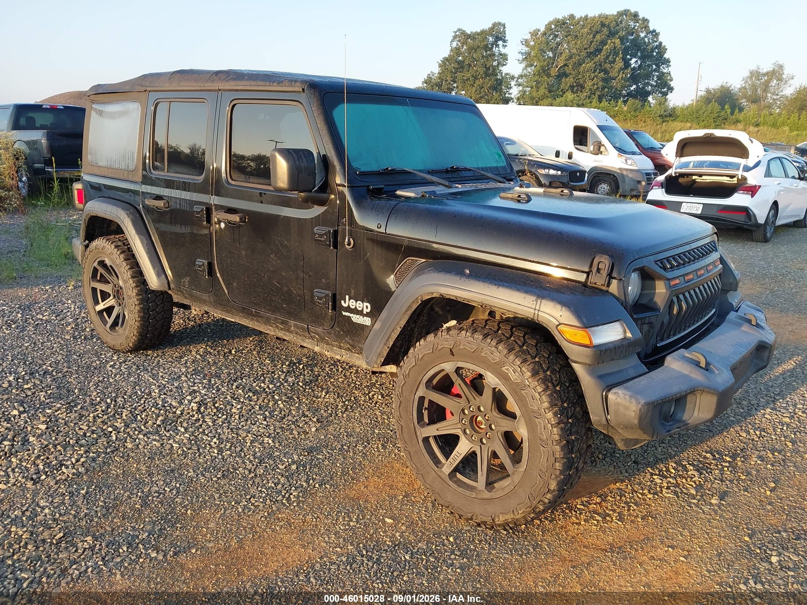 2018 Jeep Wrangler / VIN 1C4HJXDG4JW167623 IAAI salvage auction — Side, Original (West Virginia), sold $8,900 on 2026-09-18 (photo 1)