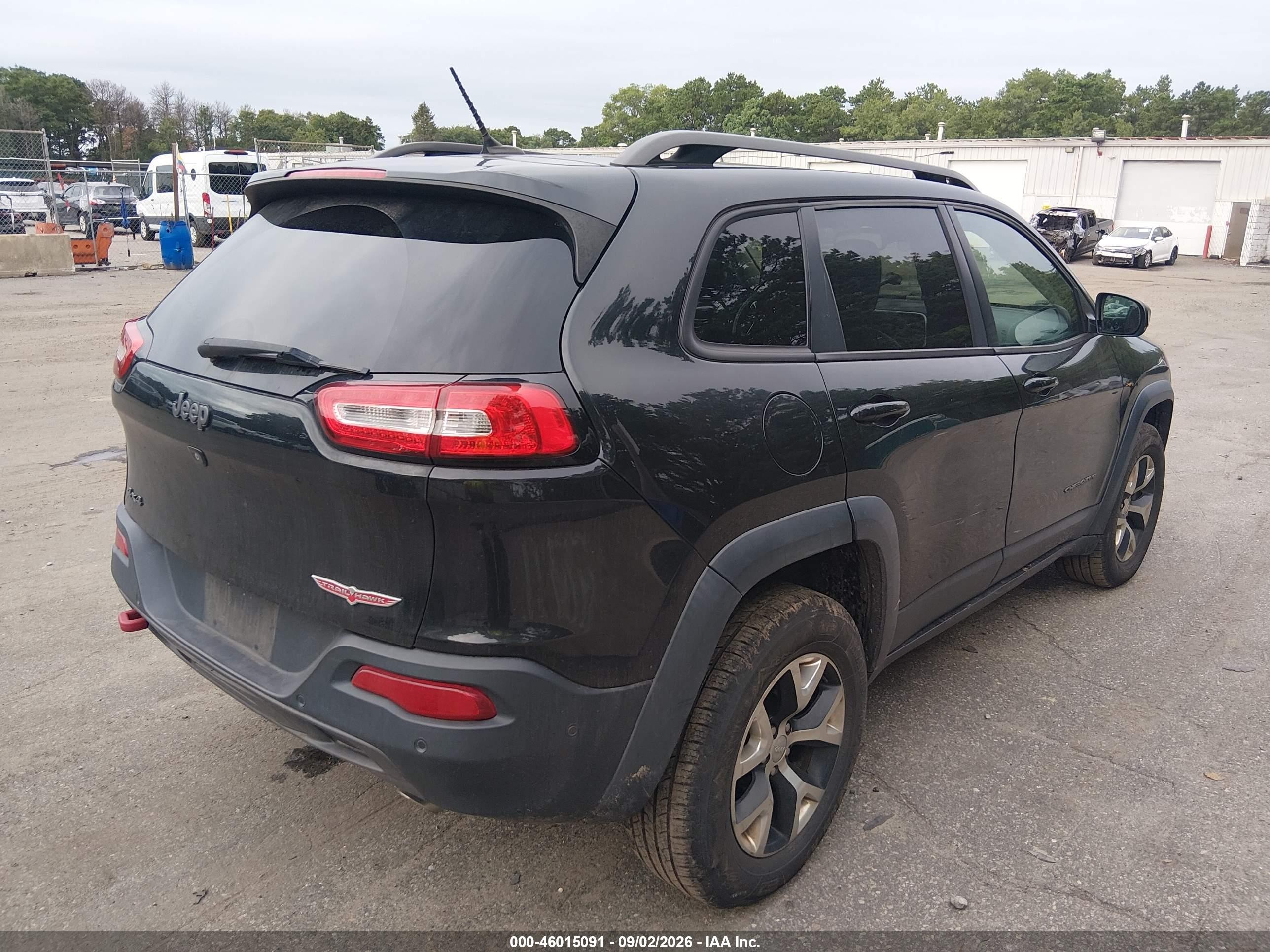 2014 Jeep Cherokee VIN 1C4PJMBS2EW161469 IAAI salvage auction — Normal Wear, Clear (New York), sold $1,650 on 2026-10-02 (photo 4)