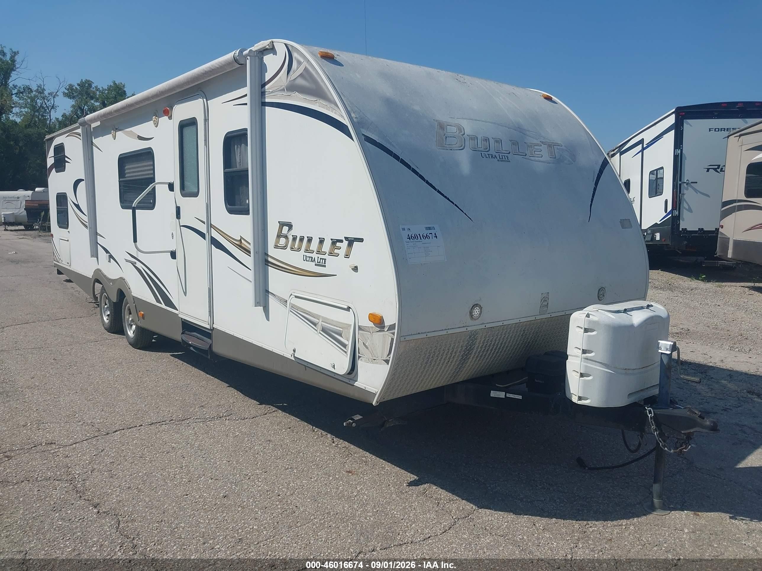 2011 Keys 286qbs-bullet Ults L VIN 4YDT28622BD422374 IAAI salvage auction — Side, Certificate Of Title (Nebraska), sold $1,875 on 2026-09-30 (photo 1)