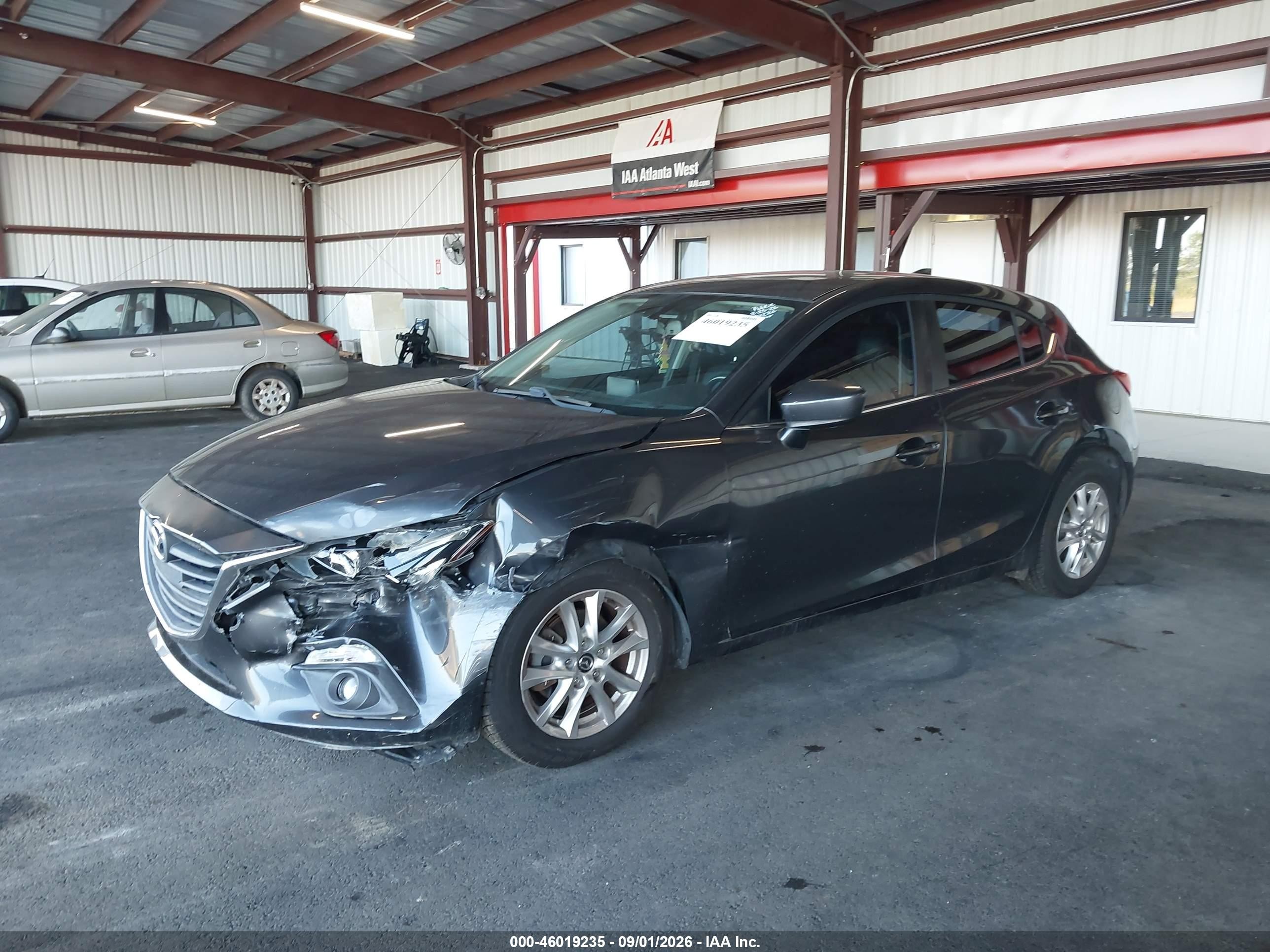 2016 Mazda 3 VIN 3MZBM1N72GM294286 IAAI salvage auction — All Over, Rebuildable (Florida), sold $2,750 on 2026-09-12 (photo 2)