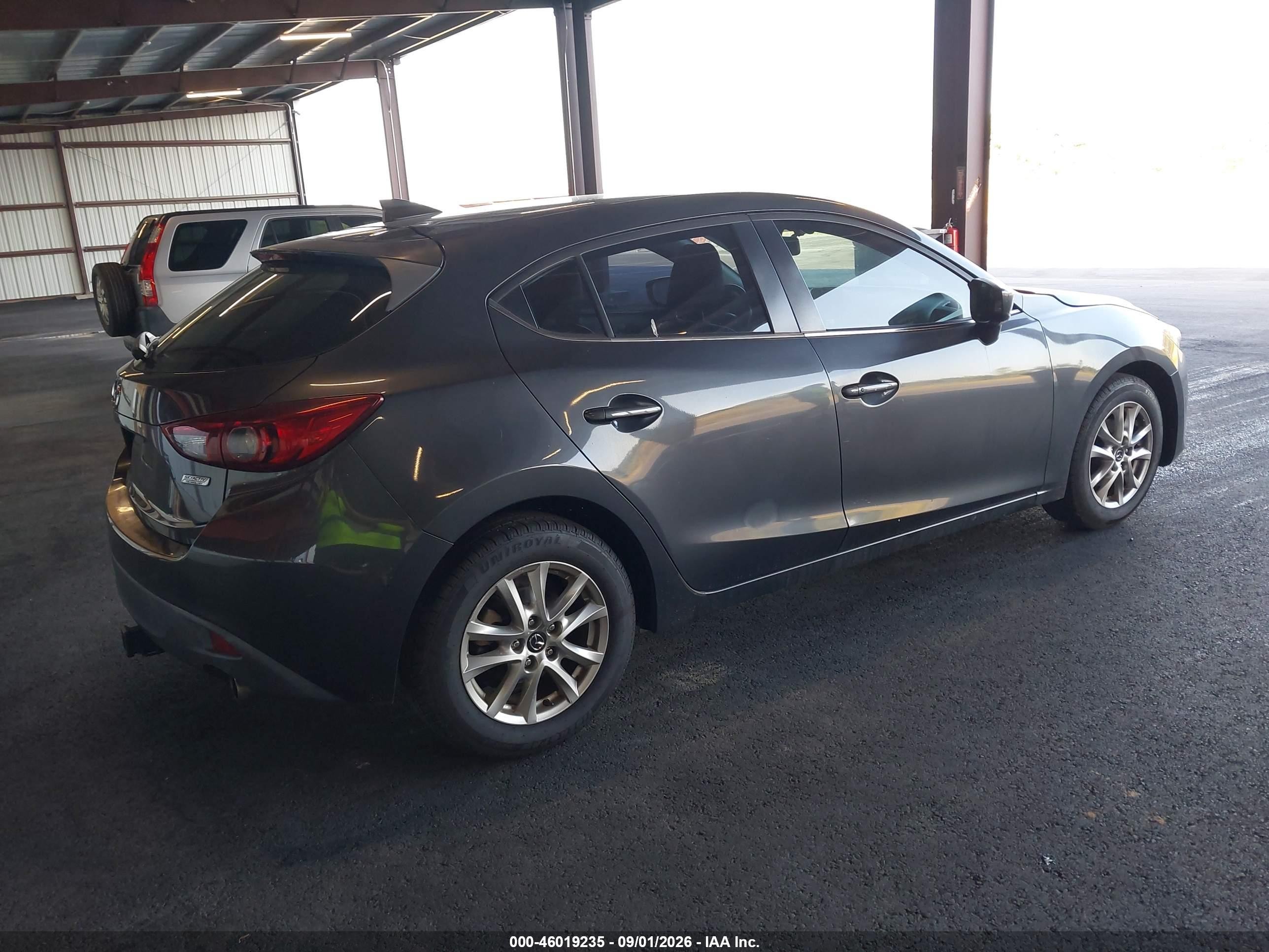2016 Mazda 3 VIN 3MZBM1N72GM294286 IAAI salvage auction — All Over, Rebuildable (Florida), sold $2,750 on 2026-09-12 (photo 4)