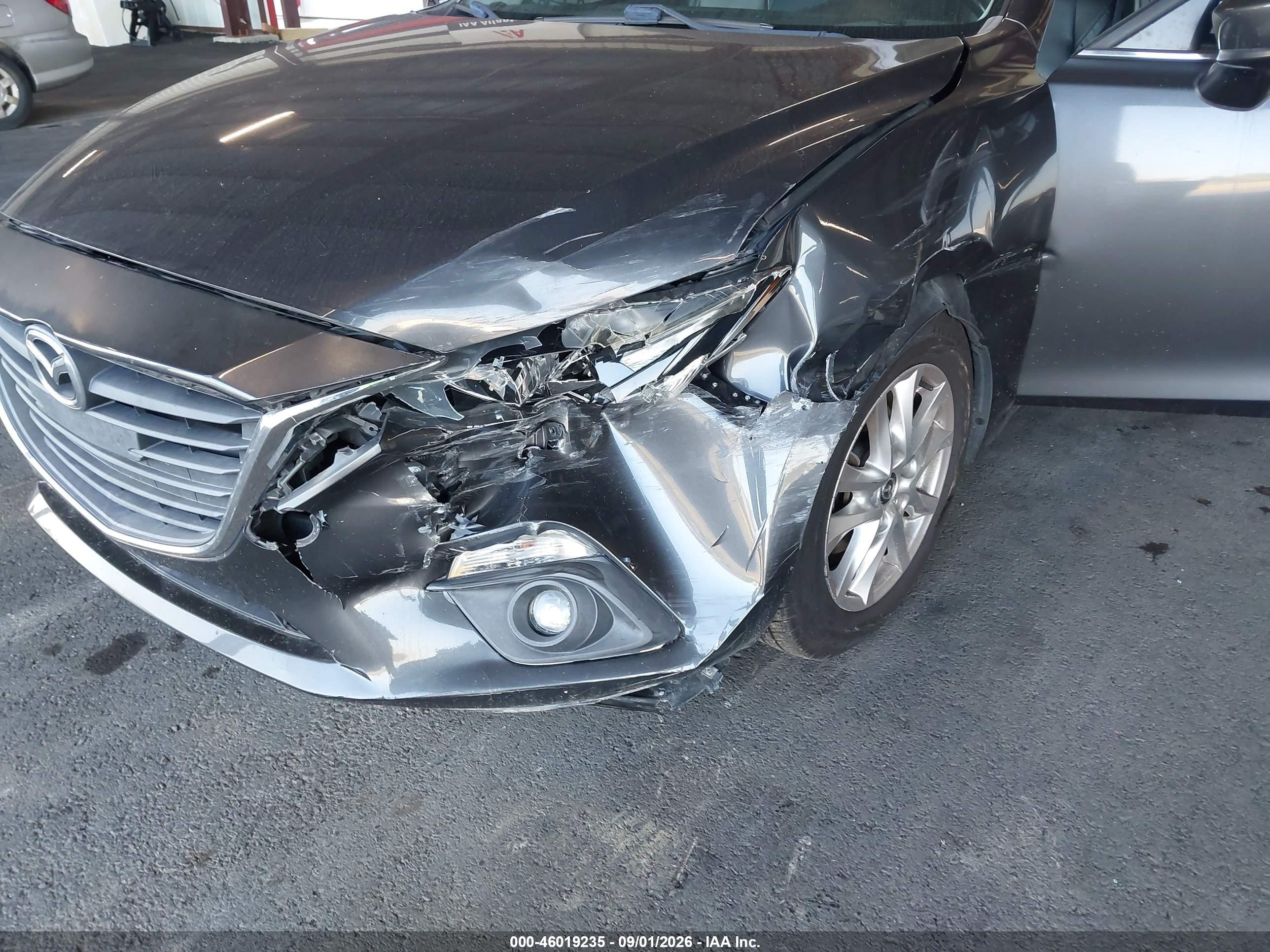 2016 Mazda 3 VIN 3MZBM1N72GM294286 IAAI salvage auction — All Over, Rebuildable (Florida), sold $2,750 on 2026-09-12 (photo 6)