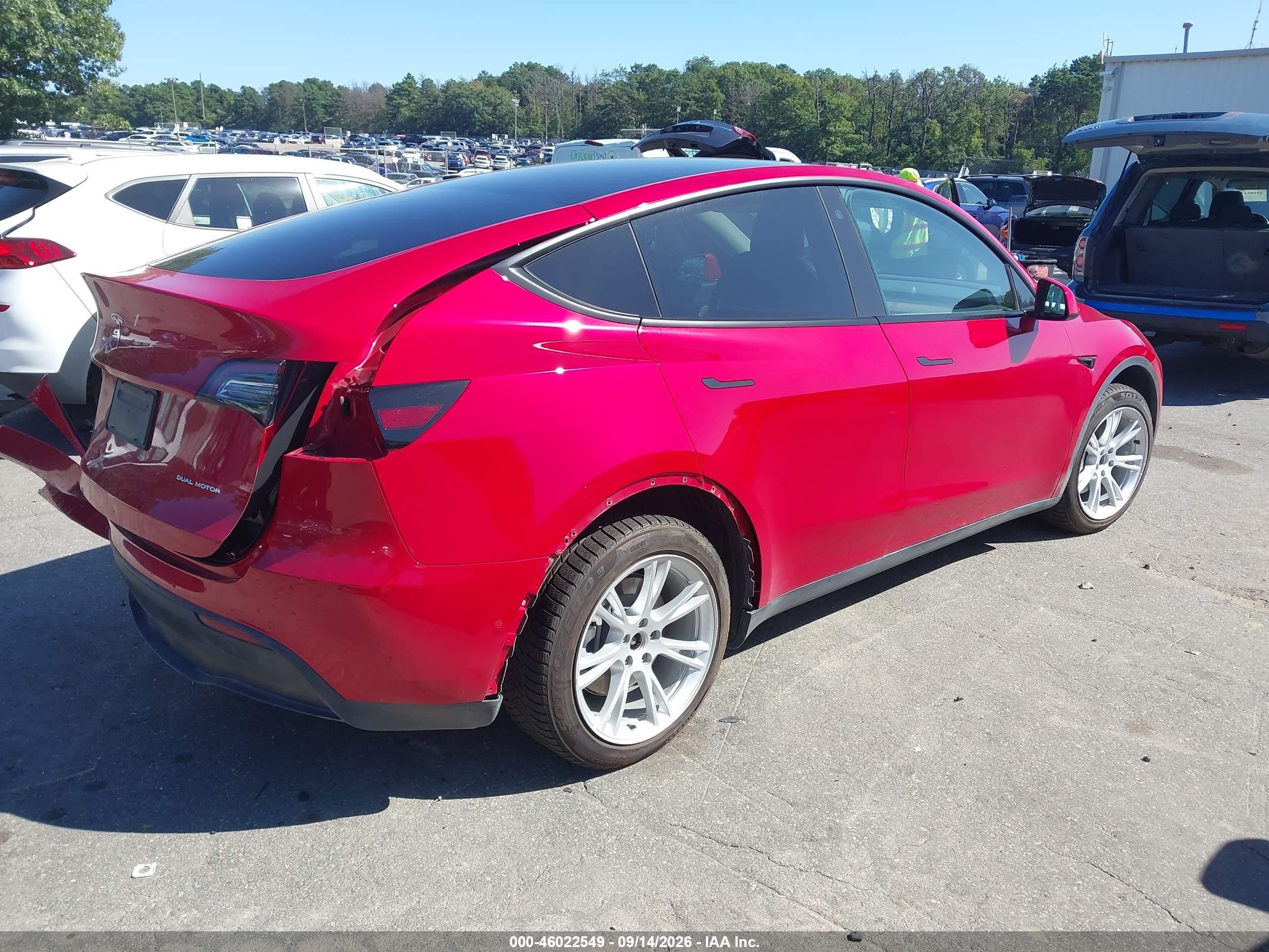 2022 Tesla Model Y VIN 7SAYGDEE8NF310032 IAAI salvage auction — Rear End, Mv-907A (New York), sold $9,800 on 2026-09-27 (photo 4)