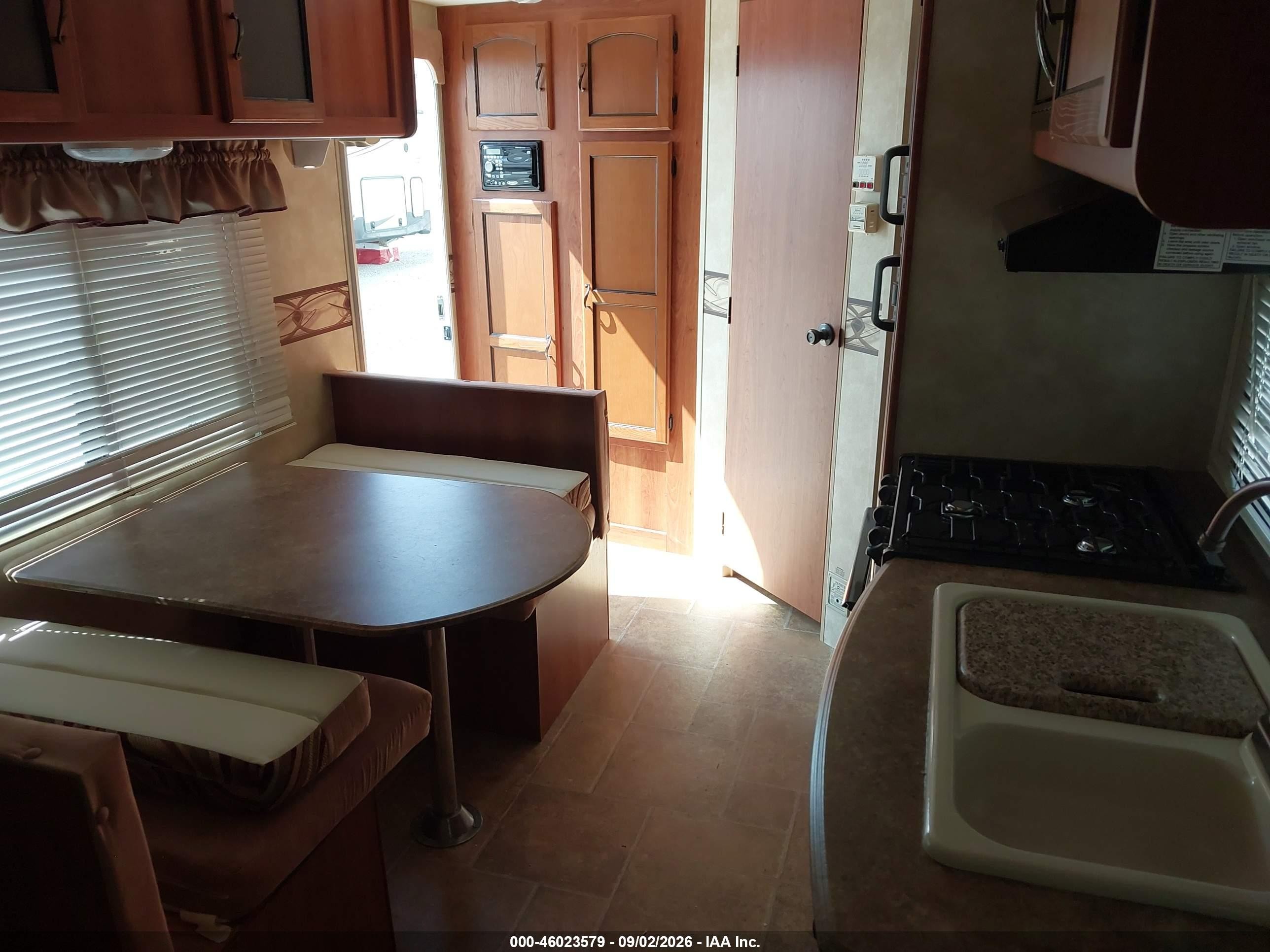2012 Coachmen Freedom Express VIN 5ZT2FEHB6CA005551 IAAI salvage auction — Hail, Certificate Of Title (Nebraska), sold $1,850 on 2026-09-24 (photo 8)