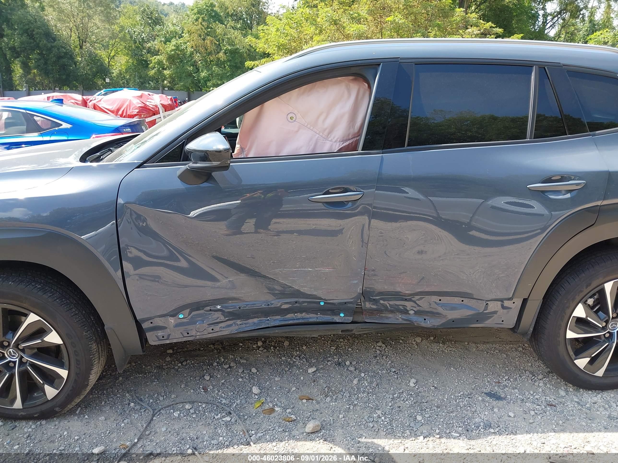 2026 Mazda Cx-50 VIN 7MMVAAEW5TN166432 IAAI salvage auction — Side, Salvage (Pennsylvania), sold $18,400 on 2026-09-30 (photo 6)