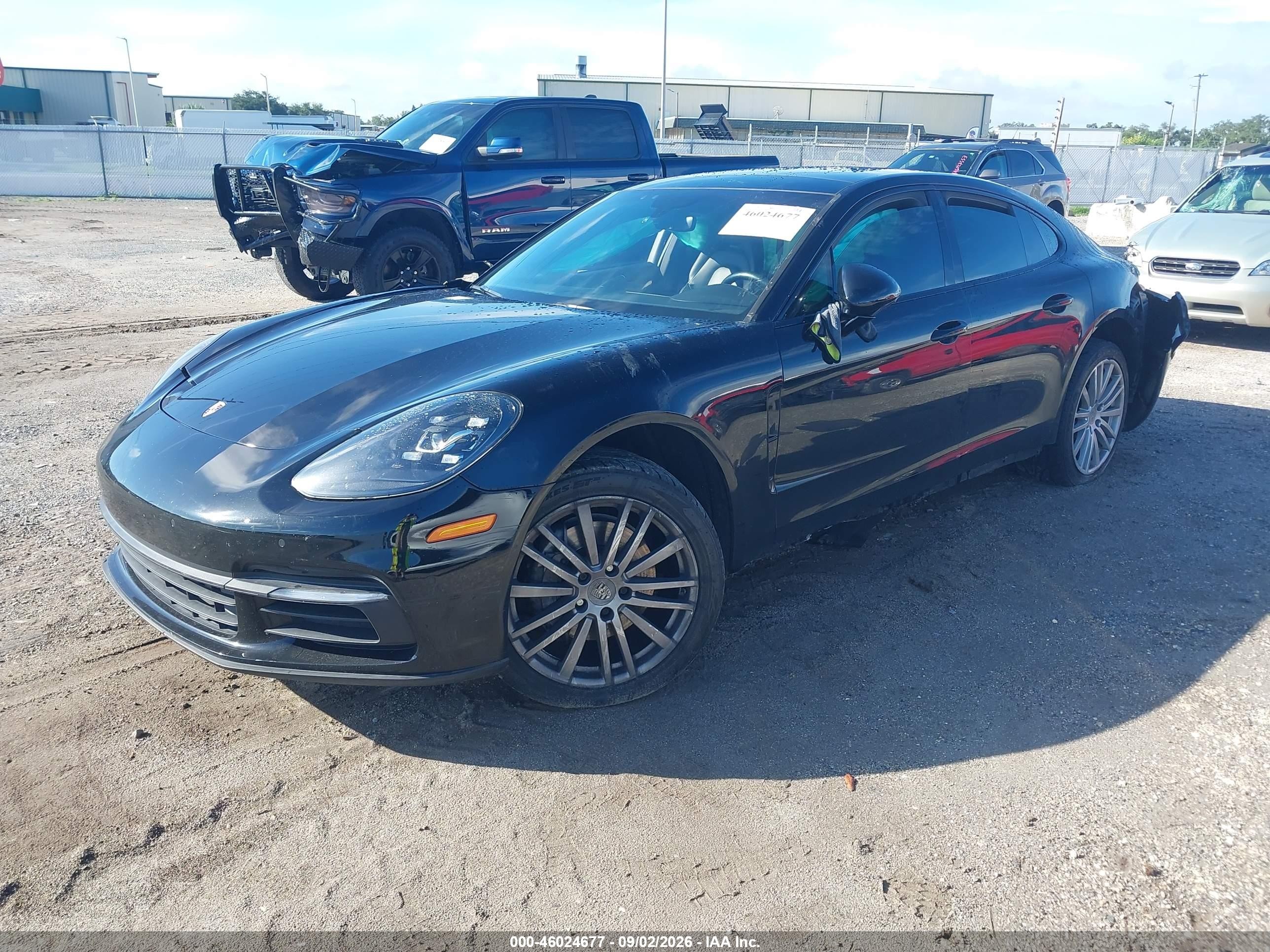 2017 Porsche Panamera VIN WP0AA2A74HL100721 IAAI salvage auction — Side, Rebuildable (Florida), sold $8,600 on 2026-10-06 (photo 2)