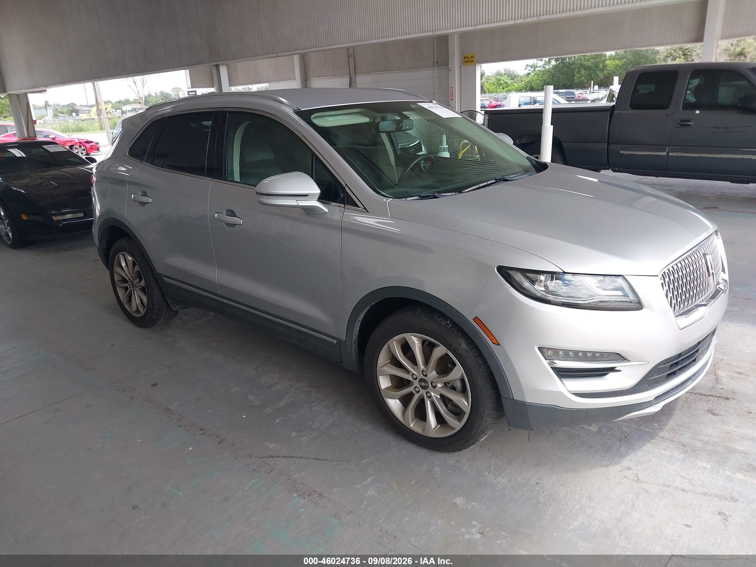 2019 Lincoln MKC VIN 5LMCJ2C9XKUL47727 IAAI salvage auction — Side, Rebuildable (Florida), sold $2,900 on 2026-09-25 (photo 1)