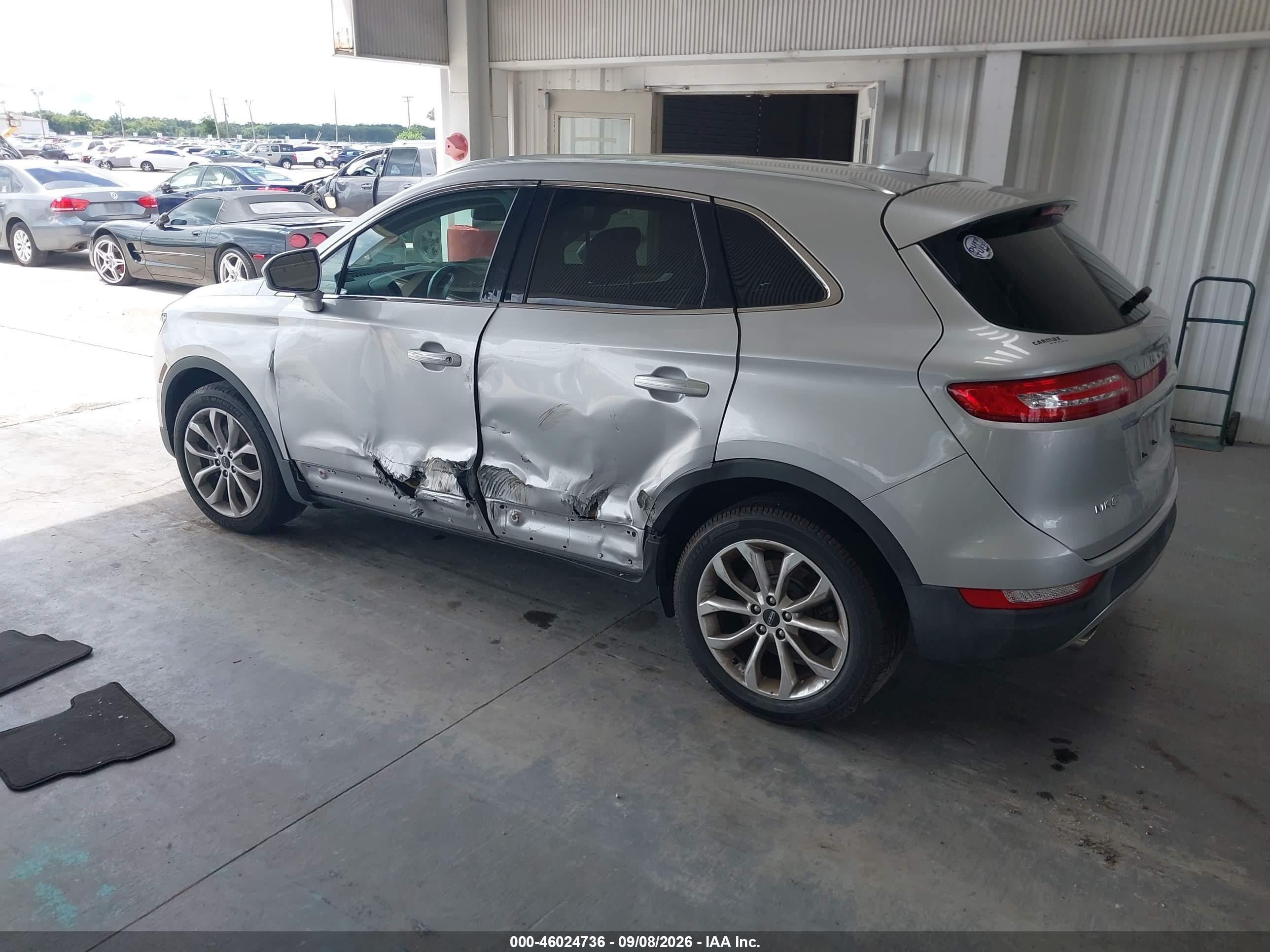 2019 Lincoln MKC VIN 5LMCJ2C9XKUL47727 IAAI salvage auction — Side, Rebuildable (Florida), sold $2,900 on 2026-09-25 (photo 3)