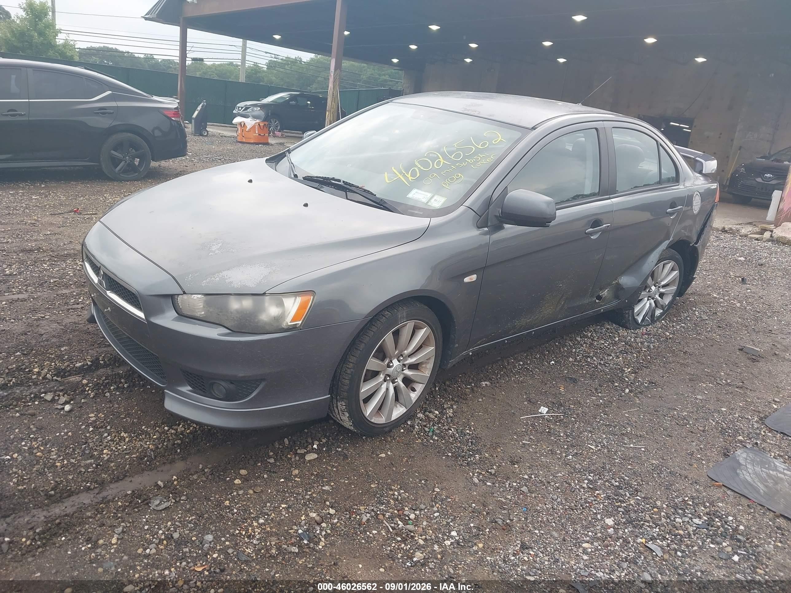 2009 Mitsubishi Lancer VIN JA3AU86WX9U002667 IAAI salvage auction — Side, Mv-907A (New York), sold $475 on 2026-09-14 (photo 2)