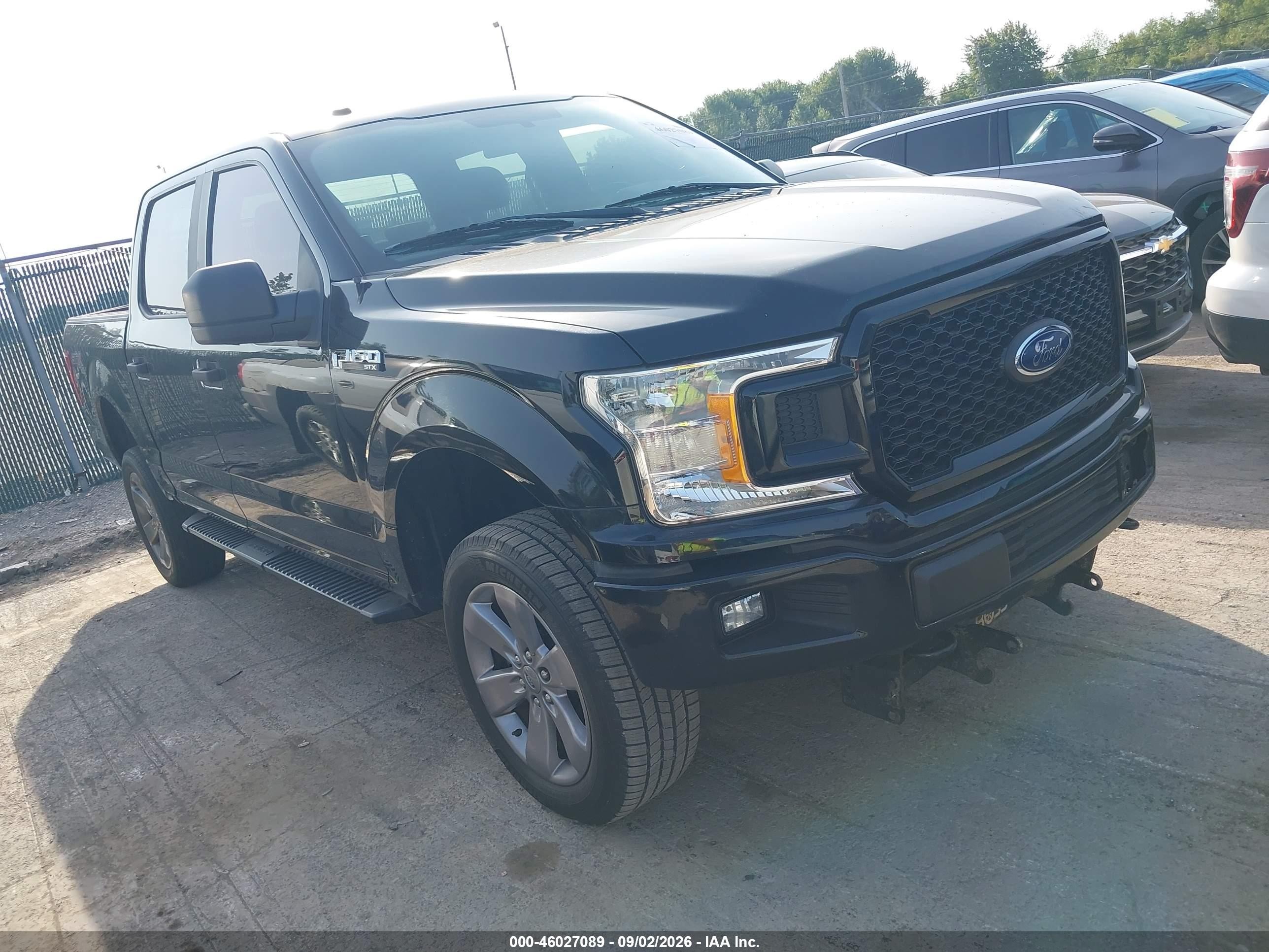 2018 Ford F-150 VIN 1FTEW1E59JKG00990 — IAAI salvage auction photo