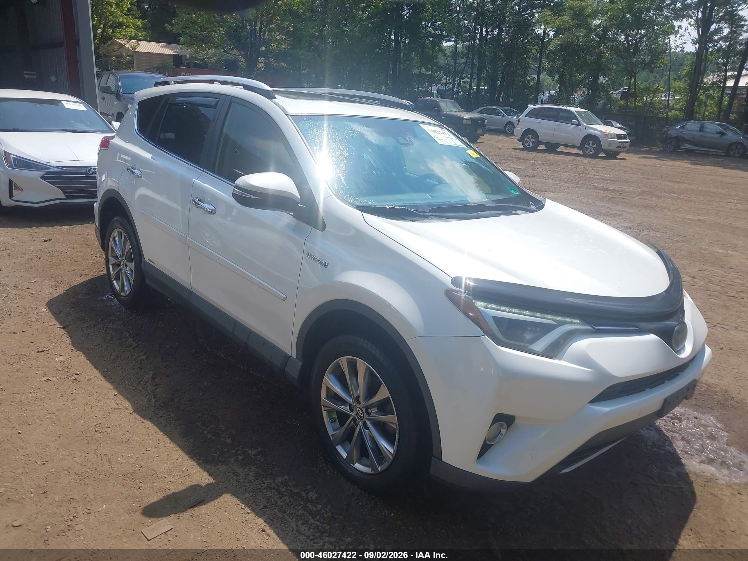 2016 Toyota RAV4 Hybrid VIN JTMDJREV2GD052286 — IAAI salvage auction photo