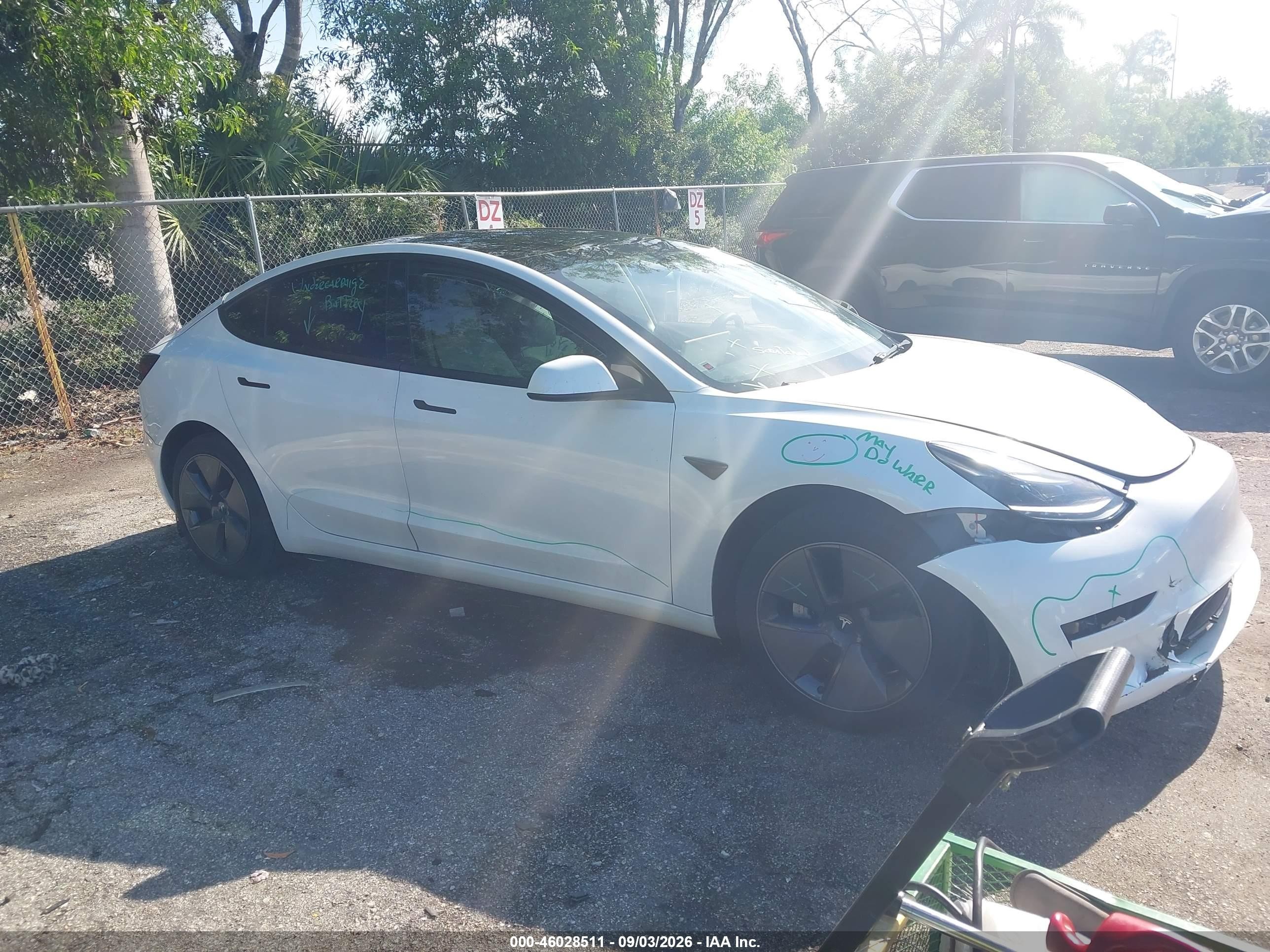 2023 Tesla Model 3 VIN 5YJ3E1EAXPF573800 — IAAI salvage auction photo
