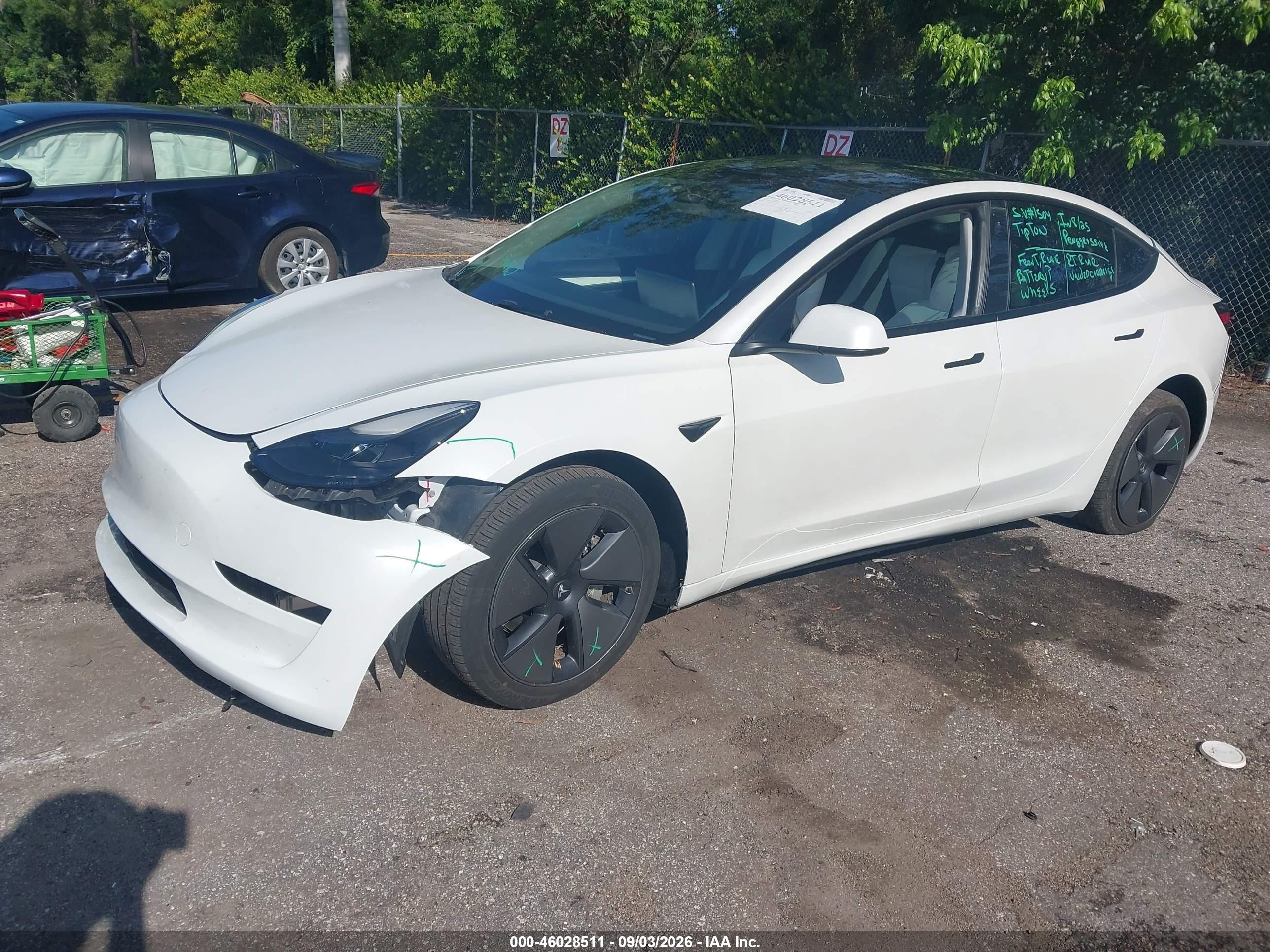 2023 Tesla Model 3 VIN 5YJ3E1EAXPF573800 IAAI salvage auction — Front End, Rebuildable (Florida), sold $6,800 on 2026-09-23 (photo 2)