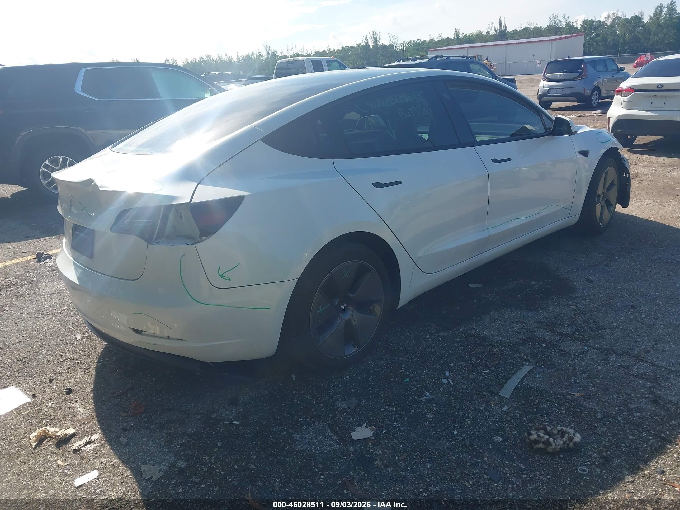 2023 Tesla Model 3 VIN 5YJ3E1EAXPF573800 IAAI salvage auction — Front End, Rebuildable (Florida), sold $6,800 on 2026-09-23 (photo 4)