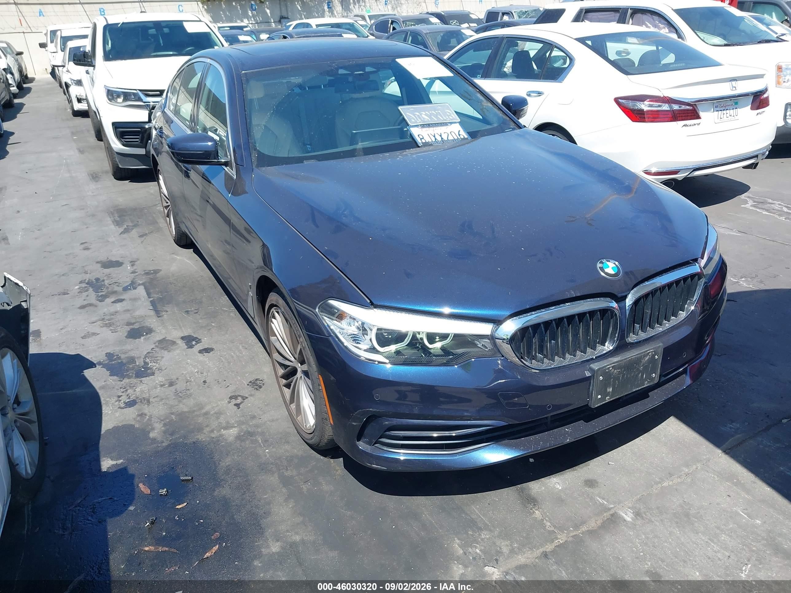 2019 BMW 5 Series VIN WBAJA9C56KB398770 — IAAI salvage auction photo