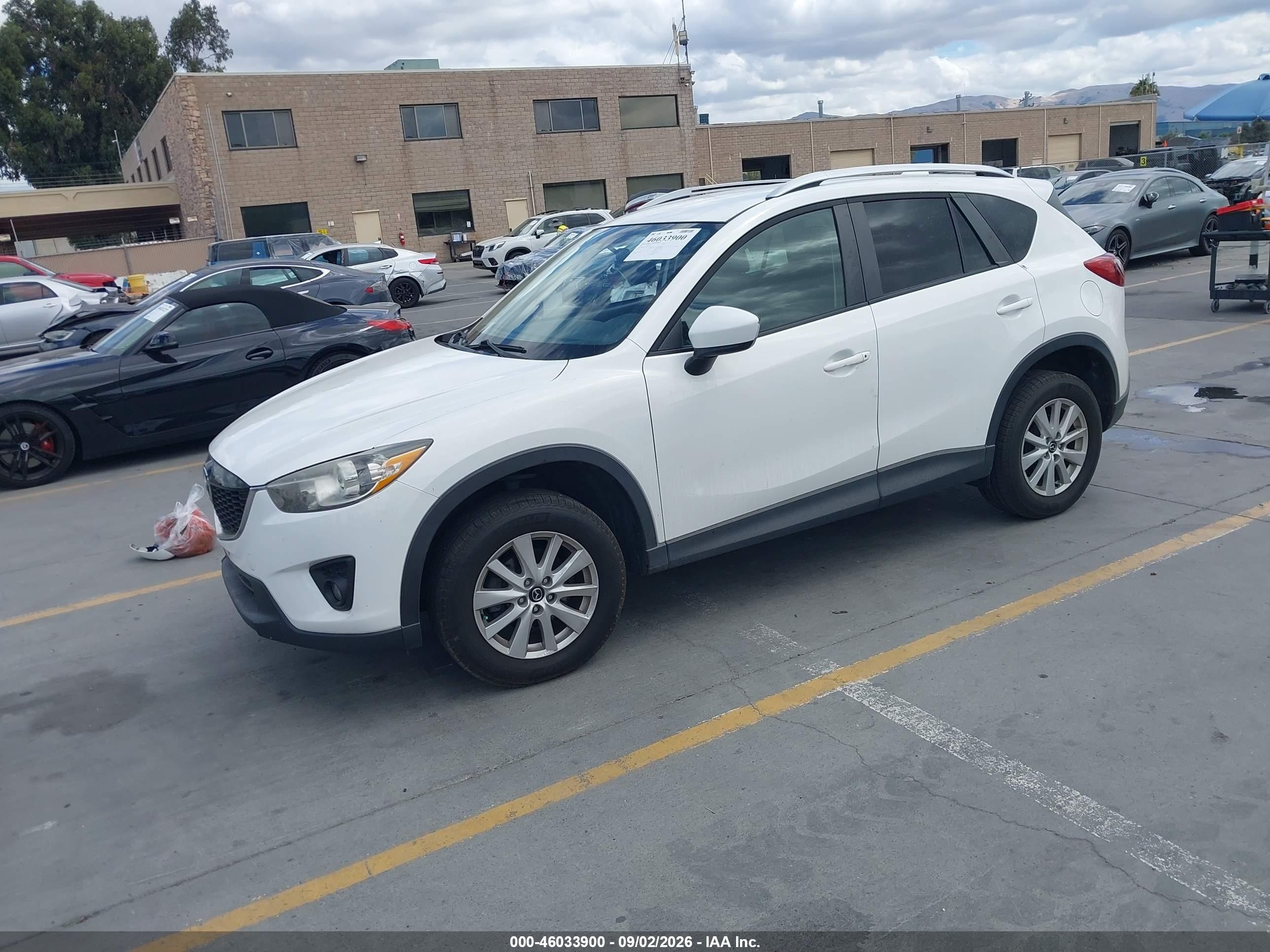 2014 Mazda Cx-5 VIN JM3KE4CY7E0375210 IAAI salvage auction — Side, Salvage (California), sold $2,900 on 2026-09-14 (photo 2)