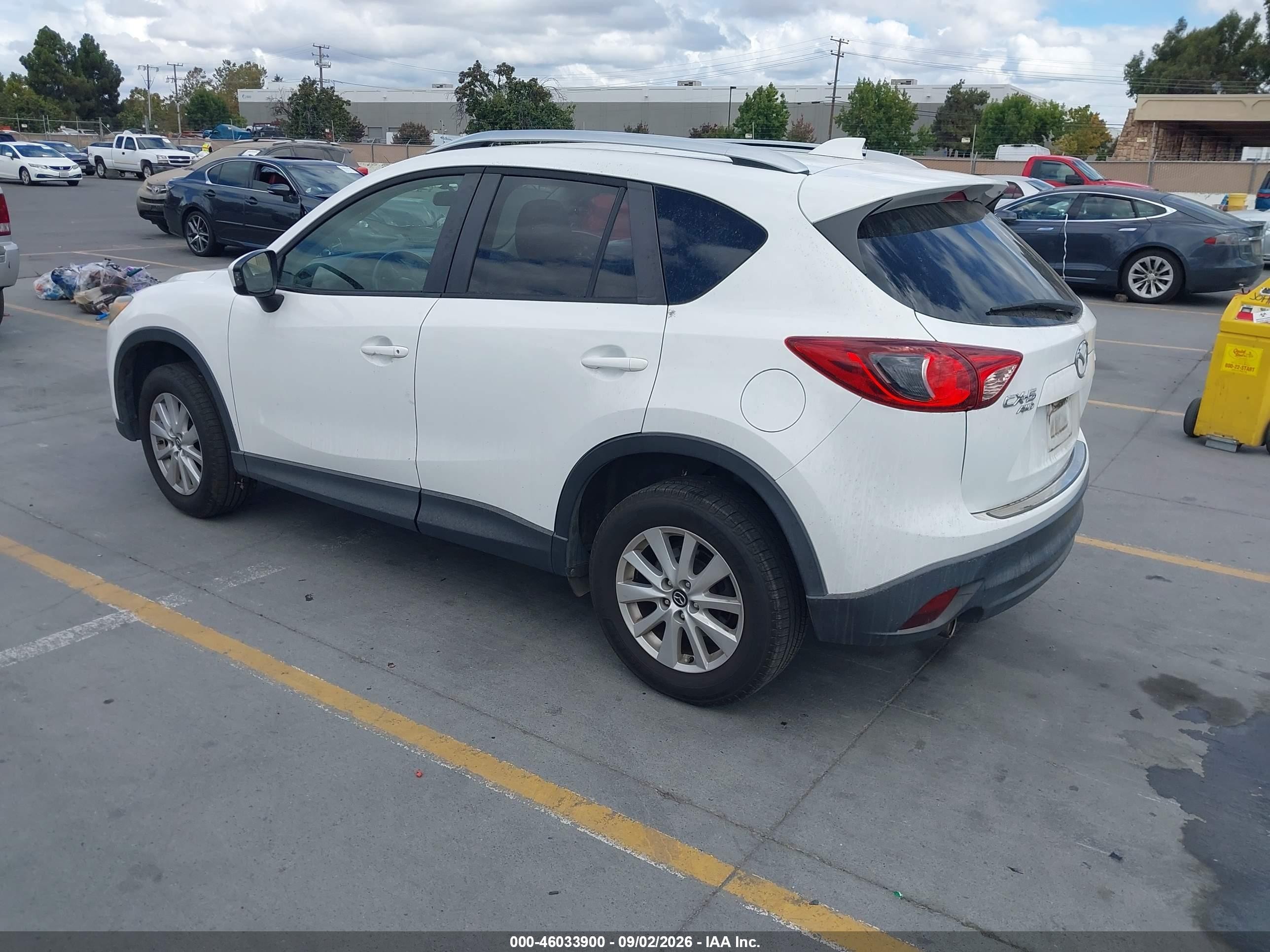 2014 Mazda Cx-5 VIN JM3KE4CY7E0375210 IAAI salvage auction — Side, Salvage (California), sold $2,900 on 2026-09-14 (photo 3)