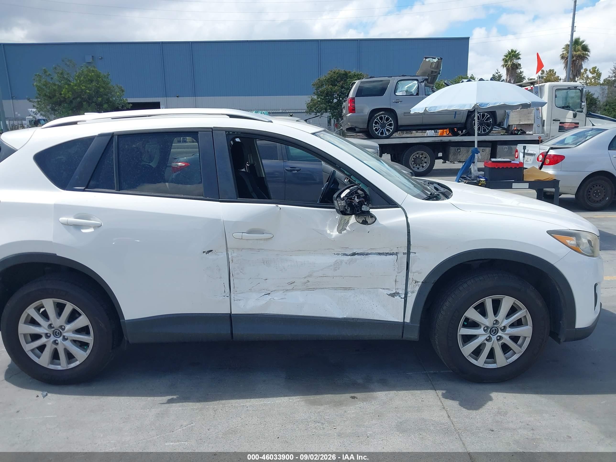 2014 Mazda Cx-5 VIN JM3KE4CY7E0375210 IAAI salvage auction — Side, Salvage (California), sold $2,900 on 2026-09-14 (photo 6)