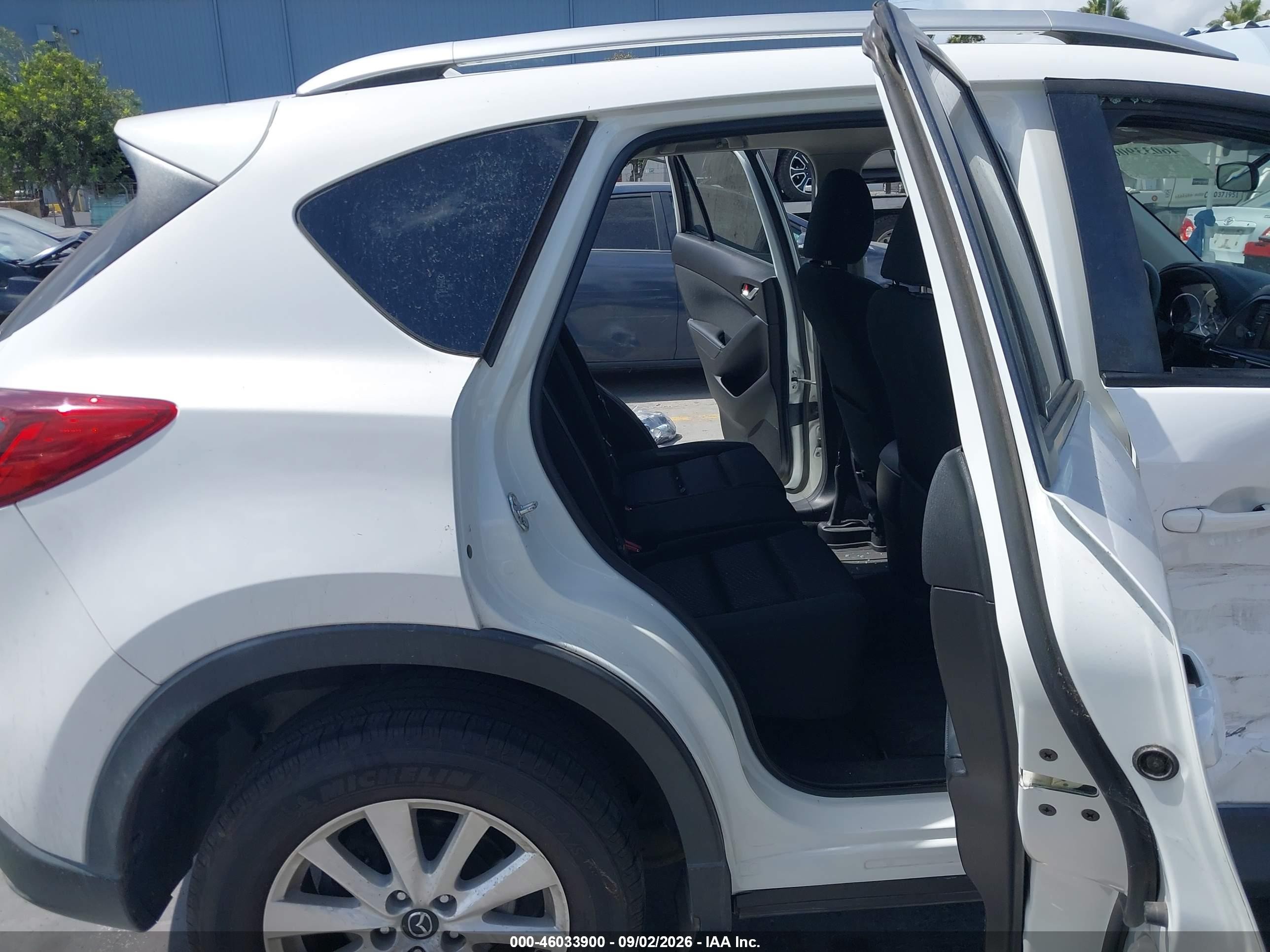2014 Mazda Cx-5 VIN JM3KE4CY7E0375210 IAAI salvage auction — Side, Salvage (California), sold $2,900 on 2026-09-14 (photo 8)