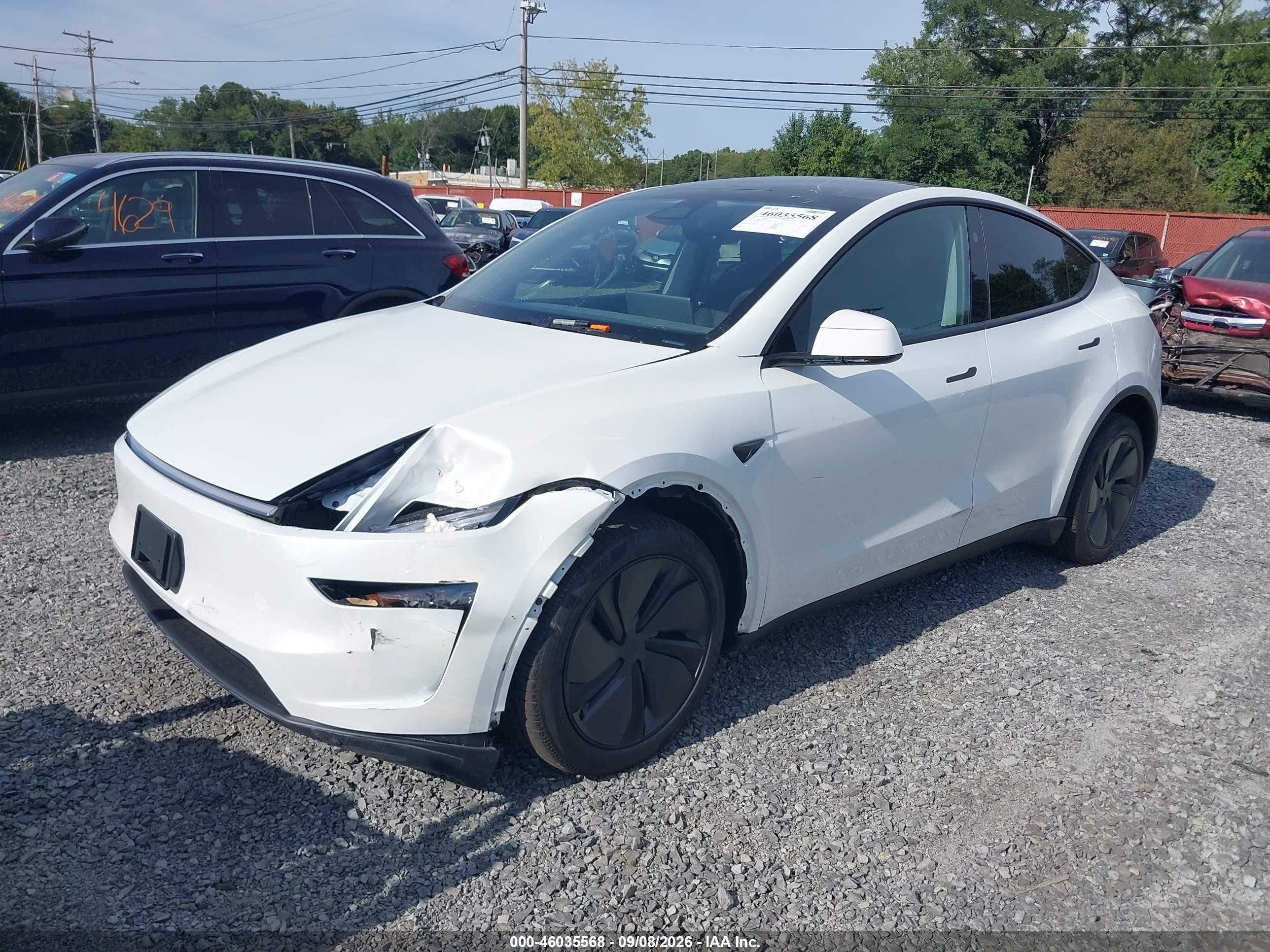 2026 Tesla Model Y VIN 7SAYGDEE4TA484187 IAAI salvage auction — Front End, Salvage (Idaho), sold $26,750 on 2026-09-18 (photo 2)