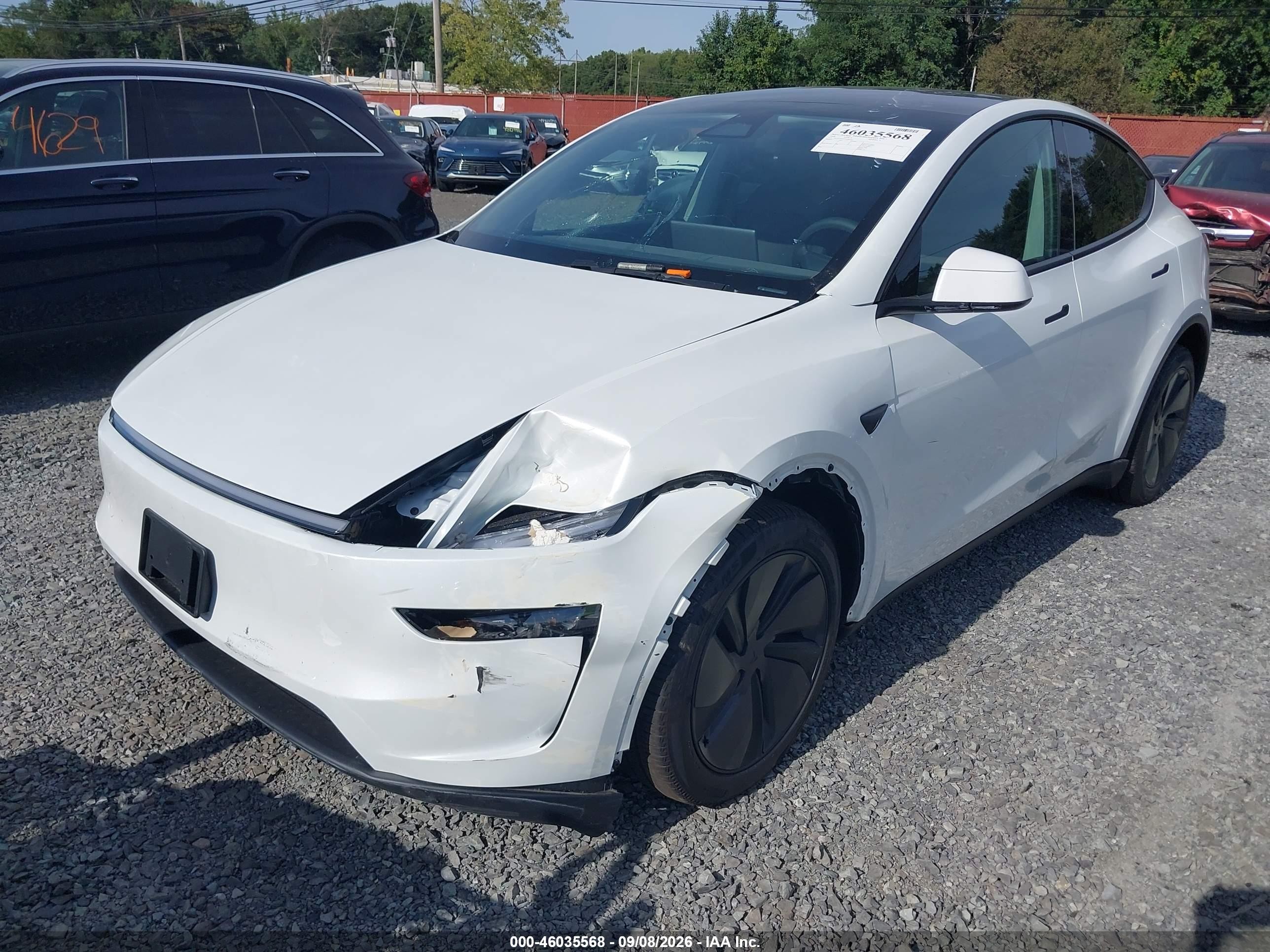 2026 Tesla Model Y VIN 7SAYGDEE4TA484187 IAAI salvage auction — Front End, Salvage (Idaho), sold $26,750 on 2026-09-18 (photo 6)