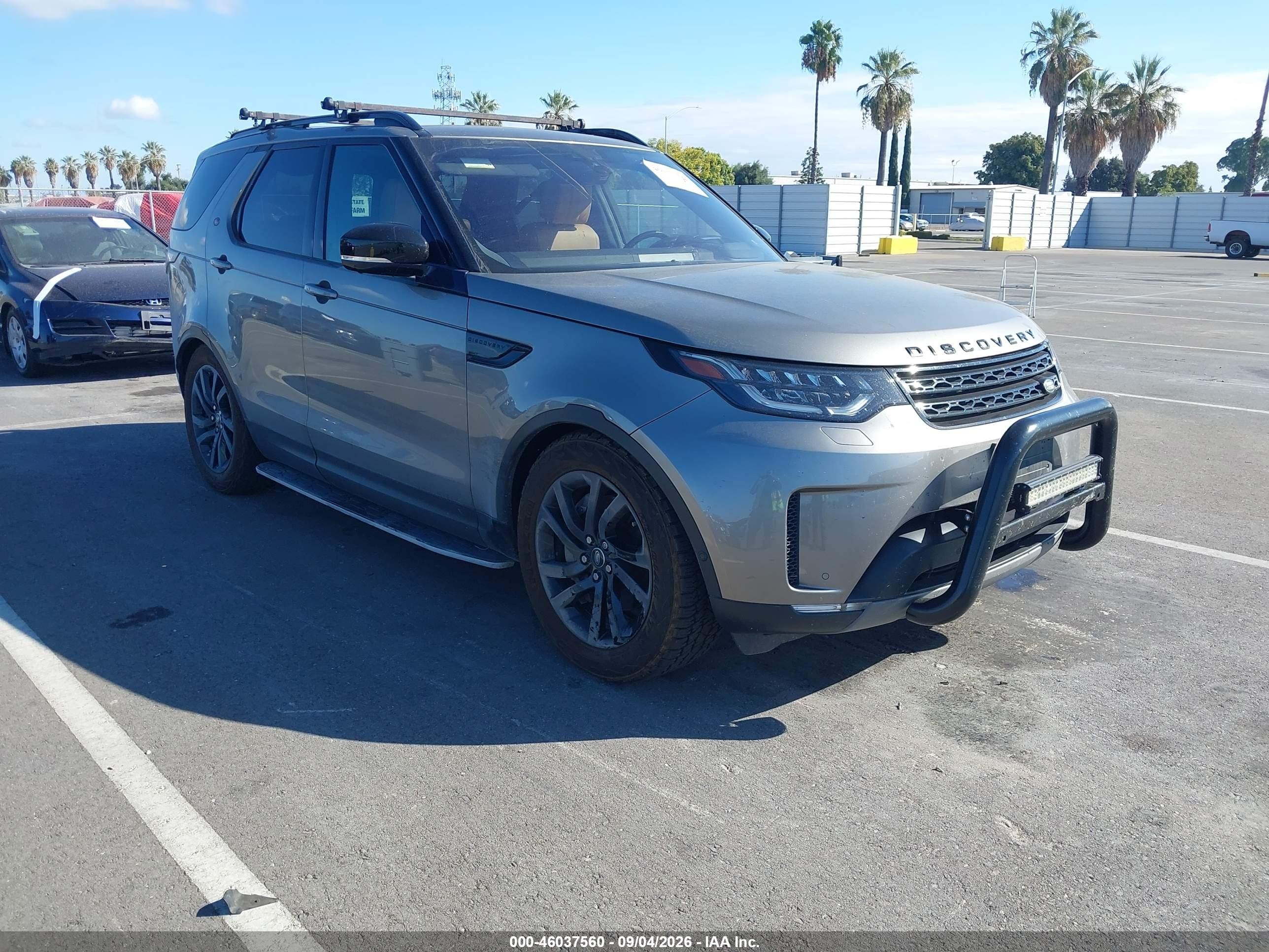 2018 Land Rover Discovery VIN SALRT2RV1JA054355 IAAI salvage auction — Unknown, Wait Title, sold $7,900 on 2026-09-21 (photo 1)