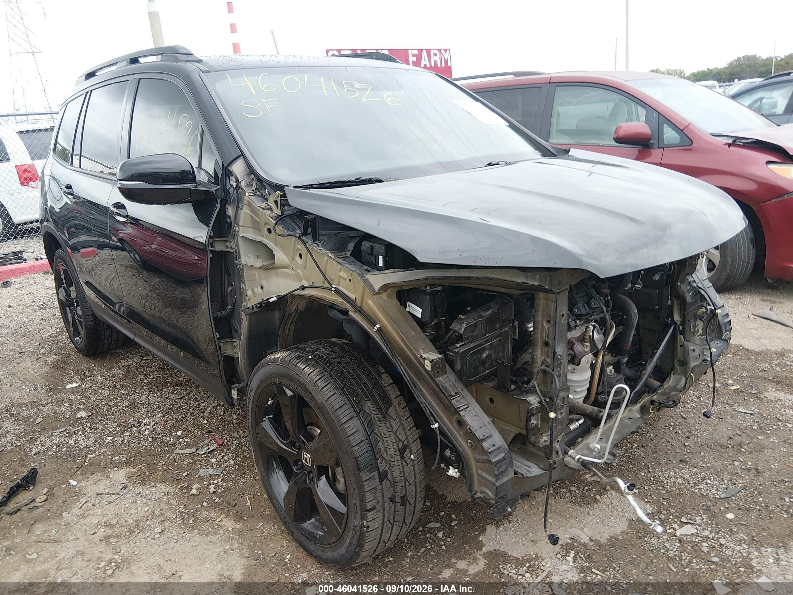 2021 Honda Passport VIN 5FNYF8H00MB002973 — IAAI salvage auction photo