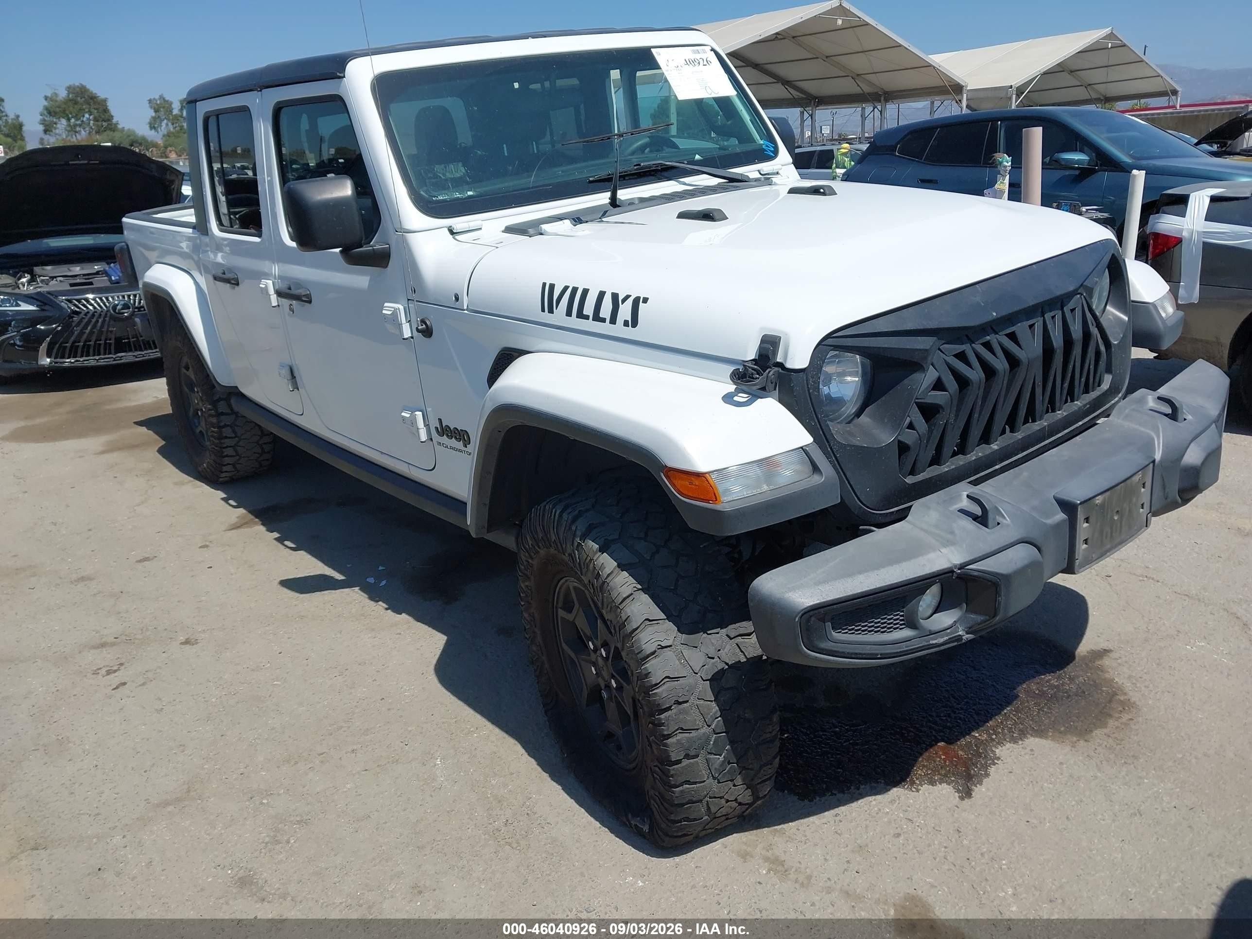 2023 Jeep Gladiator VIN 1C6HJTAG1PL526201 — IAAI salvage auction photo