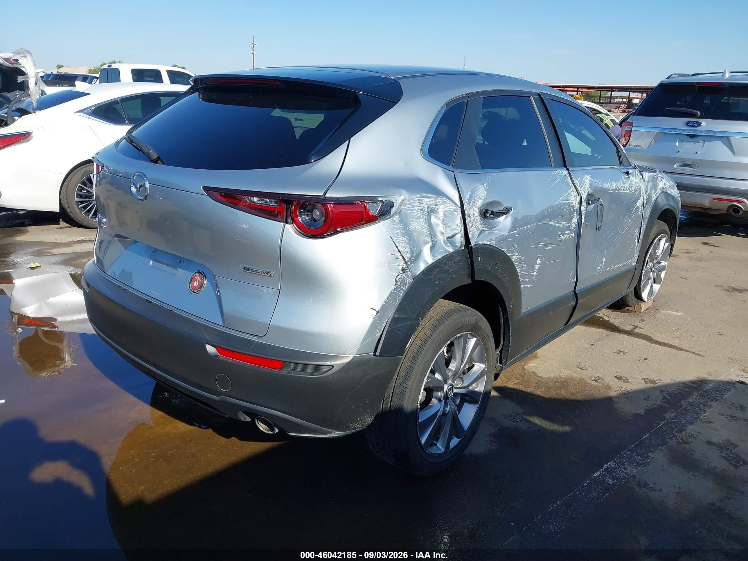 2021 Mazda CX-30 VIN 3MVDMBCL2MM311678 IAAI salvage auction — Rollover, Salvage (Arizona), sold $2,925 on 2026-09-30 (photo 4)