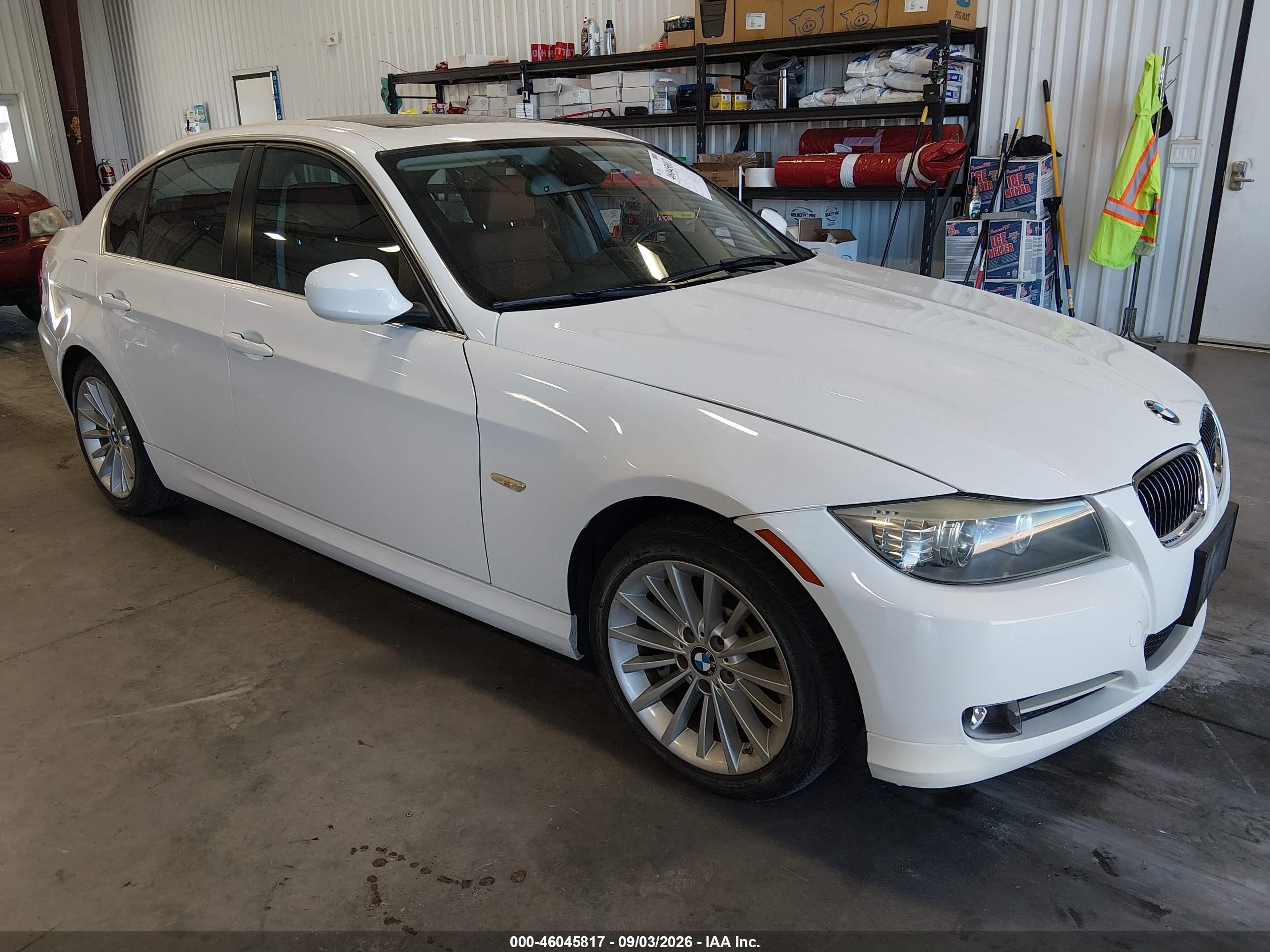 2011 BMW 3 Series VIN WBAPM5C51BE577324 — IAAI salvage auction photo