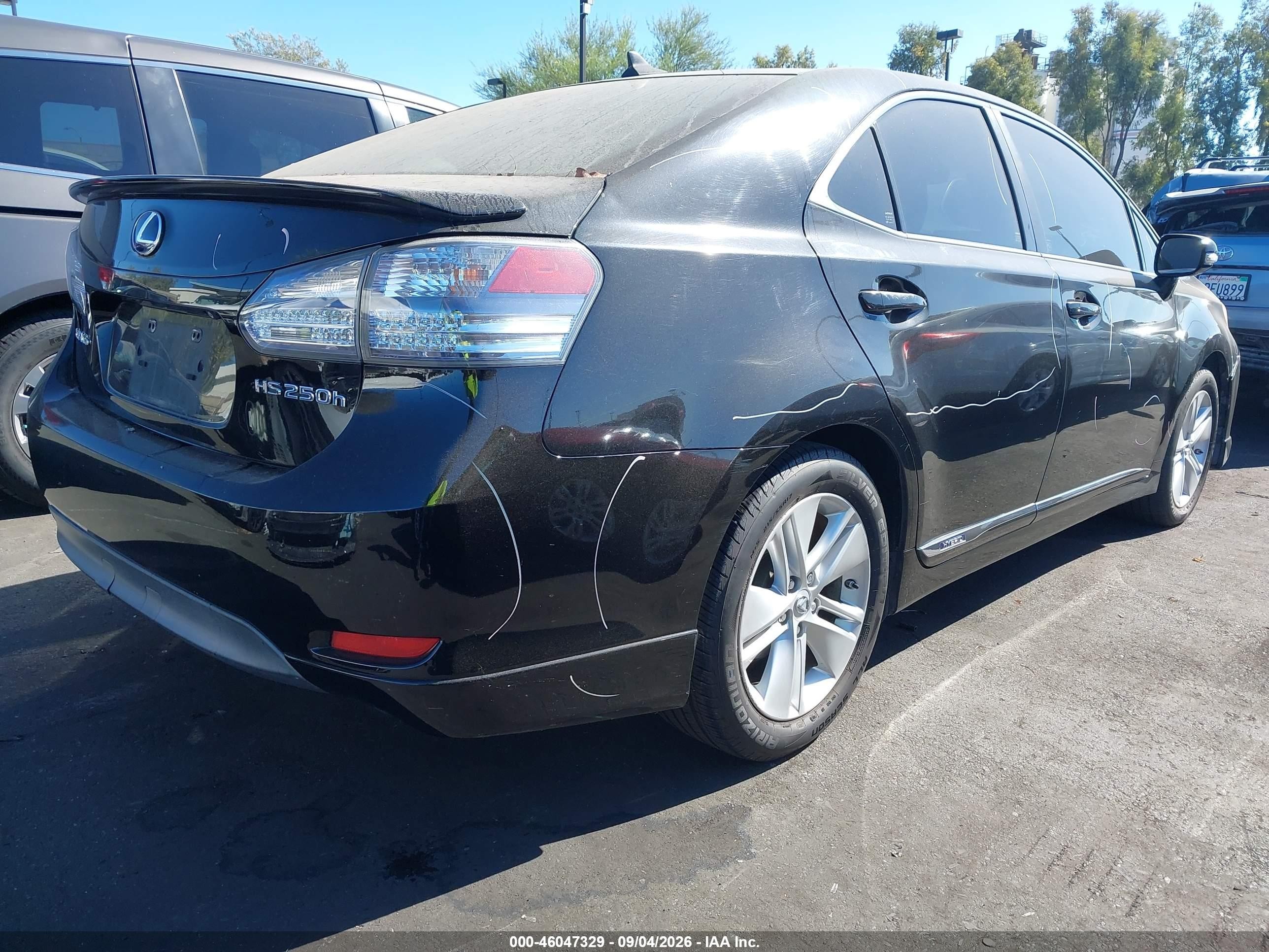 2010 Lexus HS 250h VIN JTHBB1BA4A2014275 IAAI salvage auction — Unknown, Salvage Certificate (California), sold $925 on 2026-09-13 (photo 4)