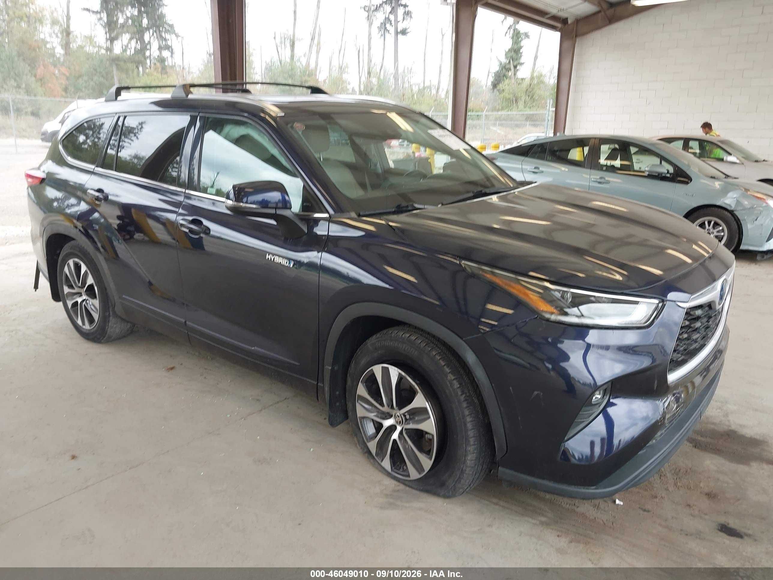 2021 Toyota Highlander Hybrid VIN 5TDHARAH5MS508590 — IAAI salvage auction photo