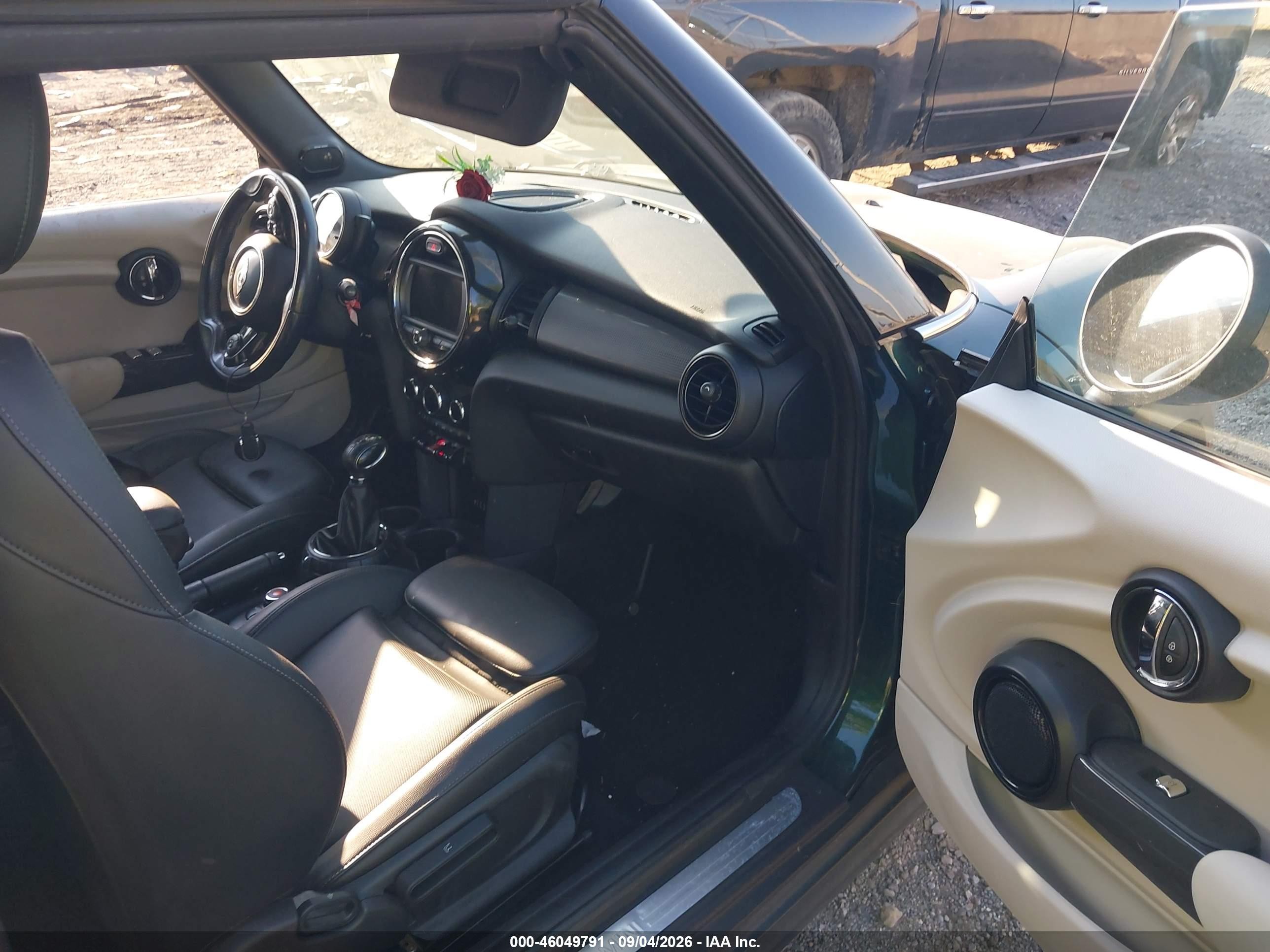 2017 Mini Convertible VIN WMWWG5C32H3C99977 IAAI salvage auction — Side, Salvage (Indiana), sold $1,650 on 2026-10-01 (photo 5)