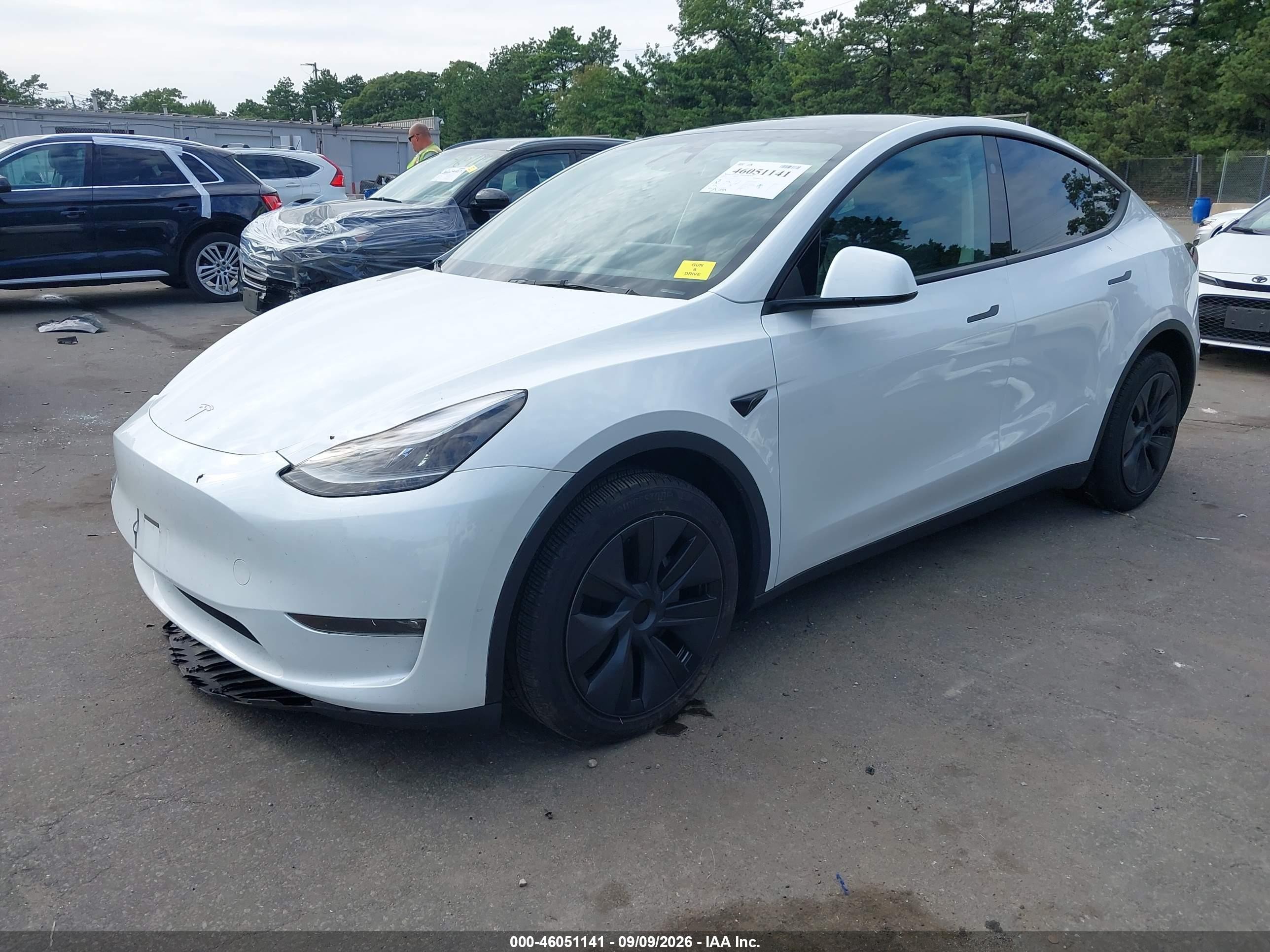 2024 Tesla Model Y VIN 7SAYGDEE0RF152663 IAAI salvage auction — Side, Mv-907A (New York), sold $14,200 on 2026-09-14 (photo 2)