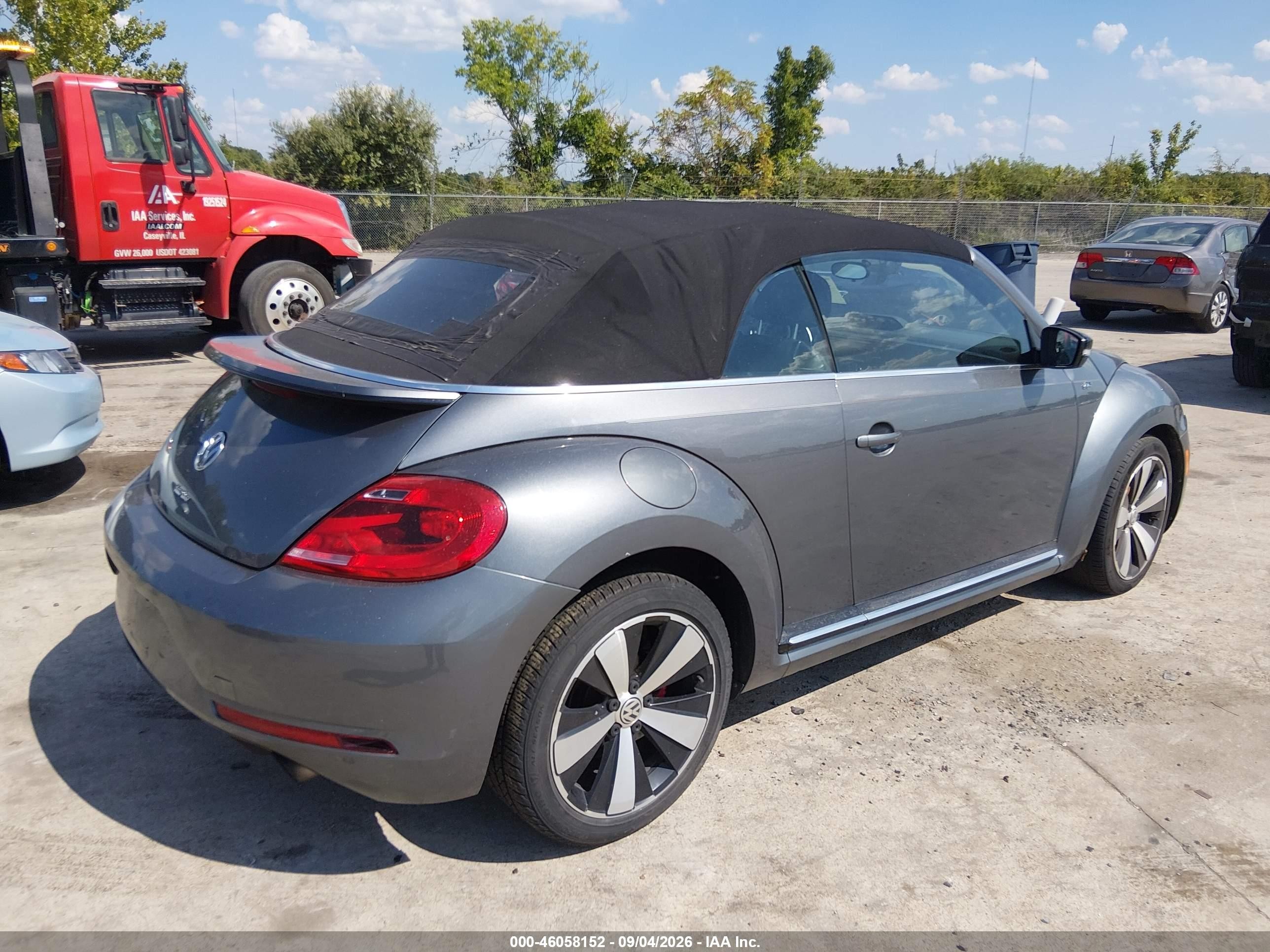 2014 Volkswagen Beetle VIN 3VW7T7AT0EM819549 IAAI salvage auction — Normal Wear, Clear (Illinois), sold $2,525 on 2026-09-29 (photo 4)