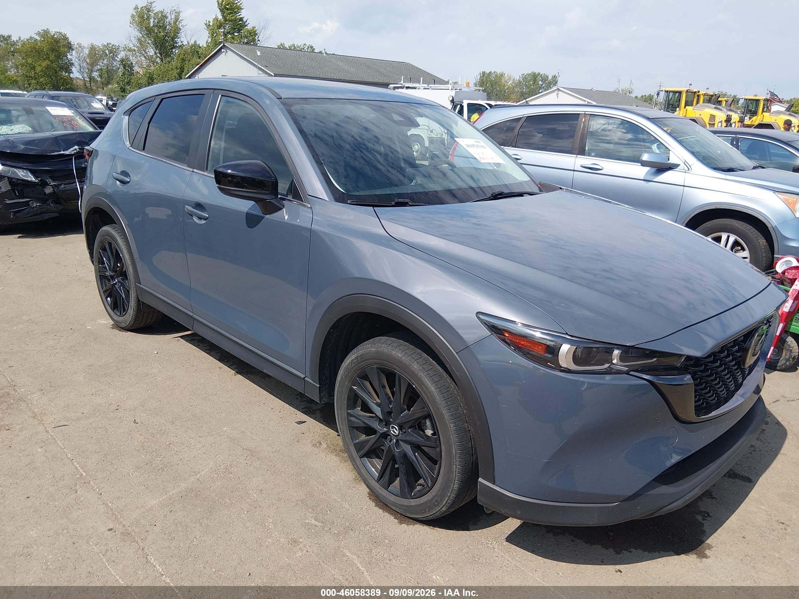 2023 Mazda CX-5 VIN JM3KFBCM6P0208869 — IAAI salvage auction photo