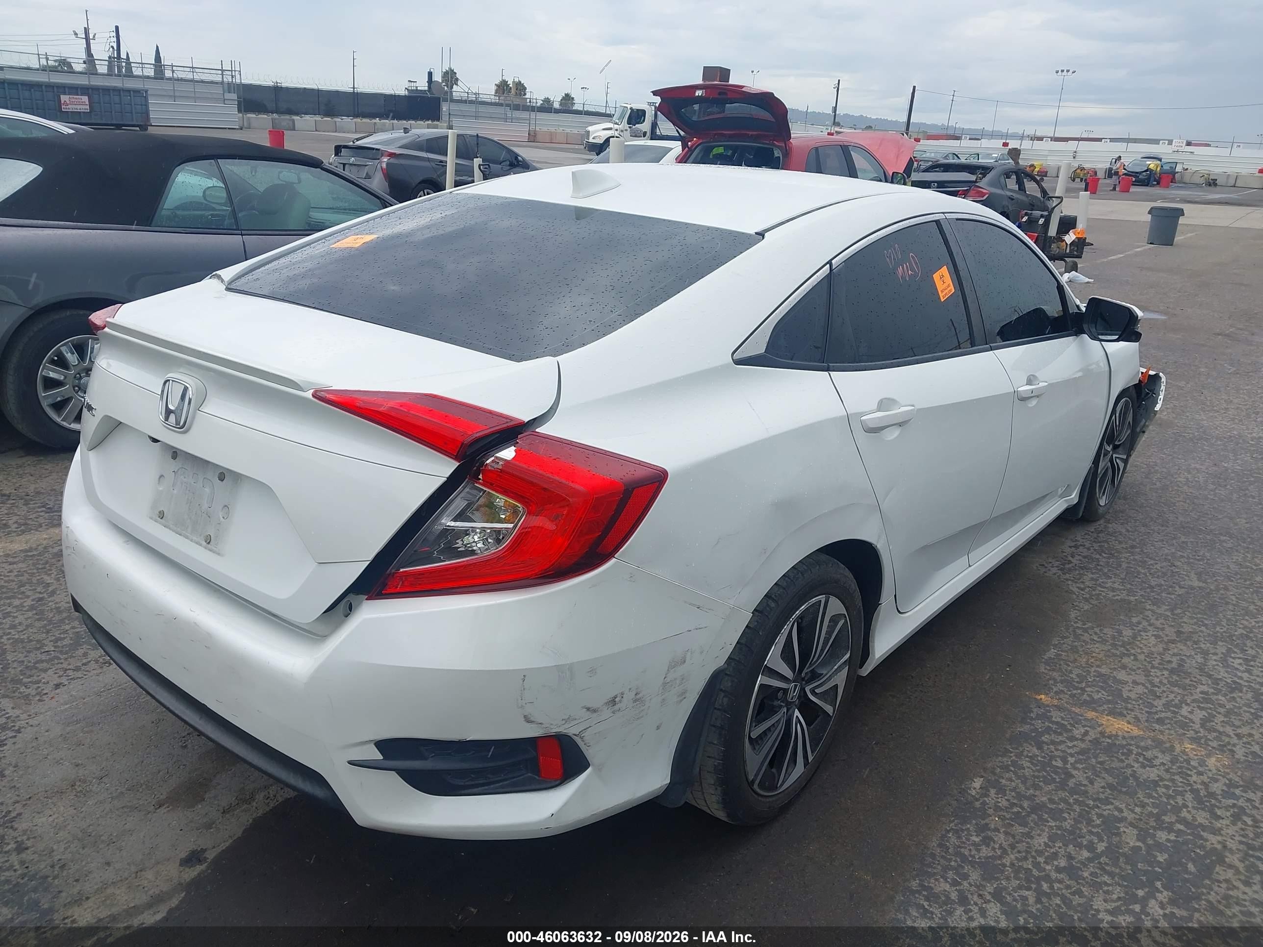 2017 Honda Civic VIN 2HGFC1F38HH636117 IAAI salvage auction — Front & Rear, Salvage (California), sold $3,350 on 2026-09-13 (photo 4)