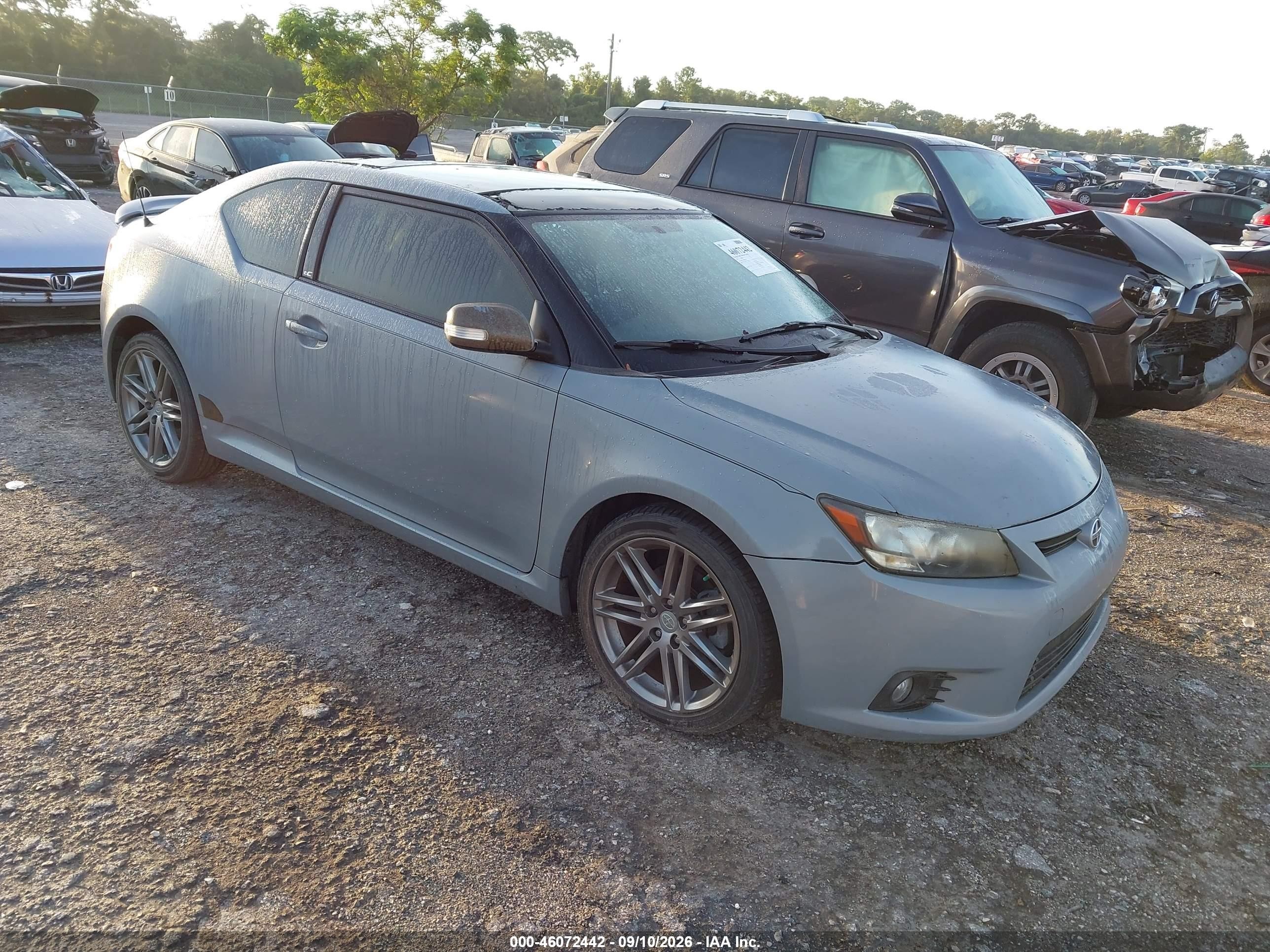 2013 Scion tC VIN JTKJF5C7XD3045288 IAAI salvage auction — Storm Damage, Rebuildable (Florida), sold $825 on 2026-09-17 (photo 1)