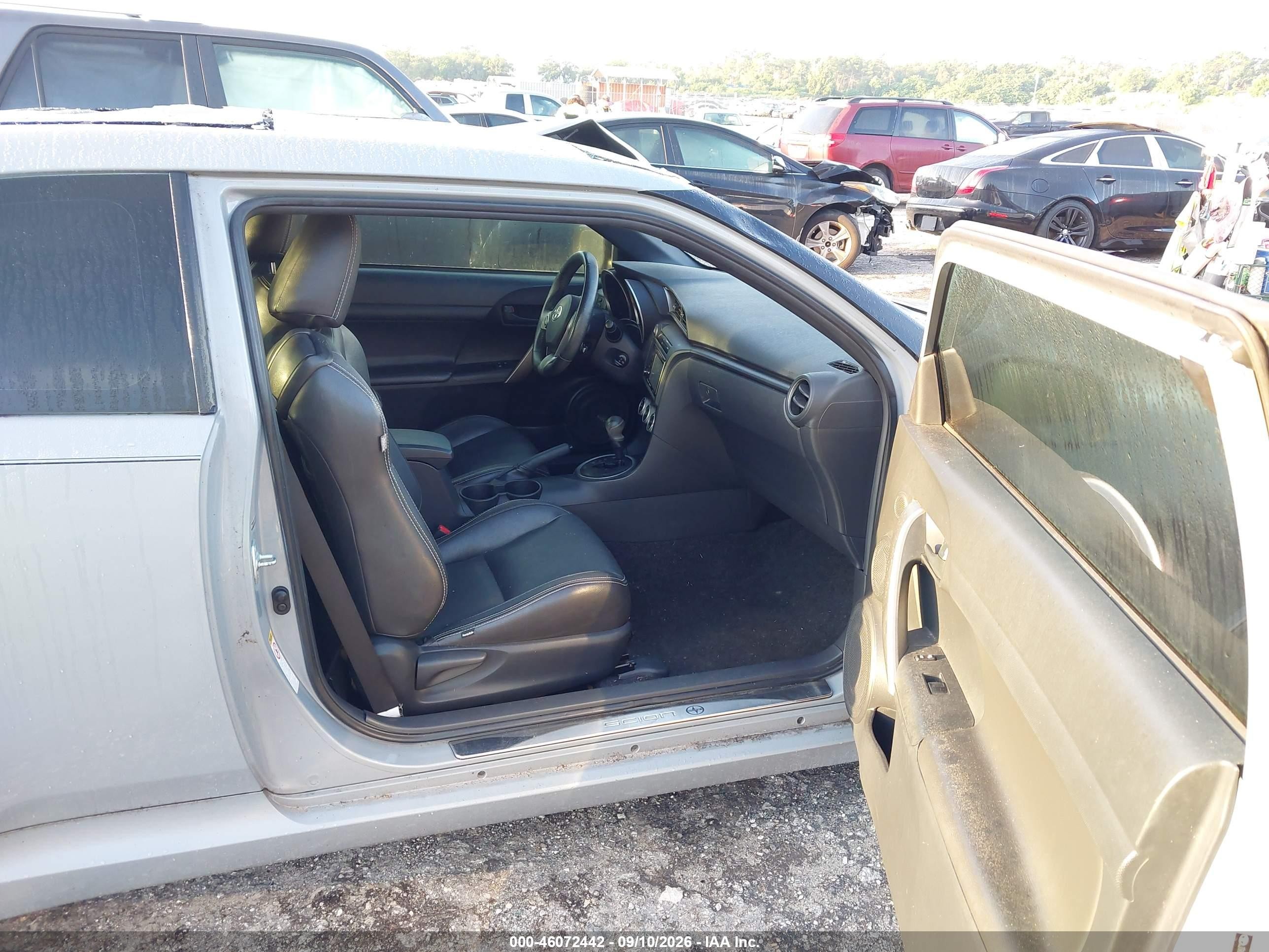 2013 Scion tC VIN JTKJF5C7XD3045288 IAAI salvage auction — Storm Damage, Rebuildable (Florida), sold $825 on 2026-09-17 (photo 5)