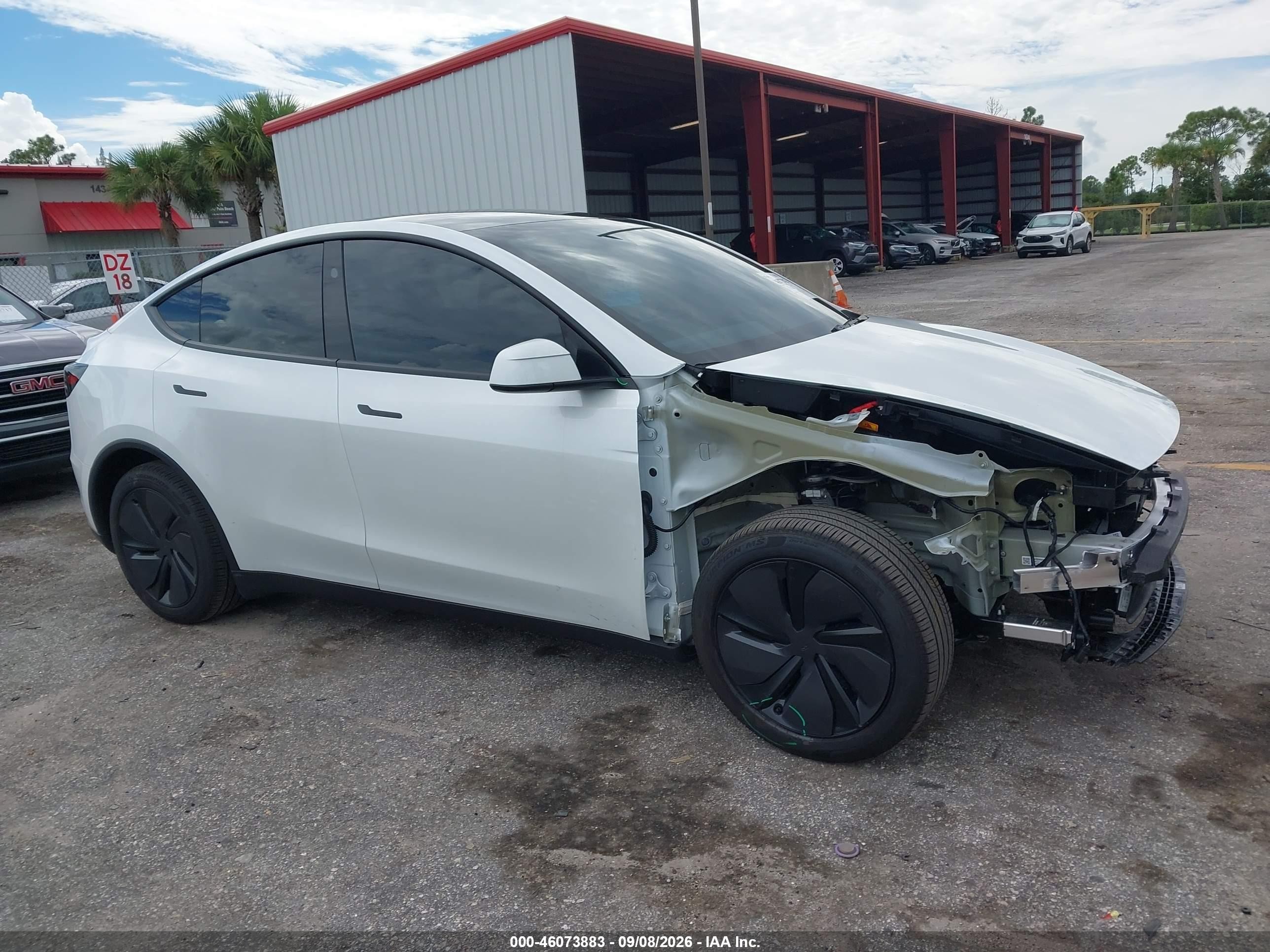 2026 Tesla Model y VIN 7SAYGDED2TA477066 IAAI salvage auction — Front End, Rebuildable (Florida), sold $20,600 on 2026-10-08 (photo 1)