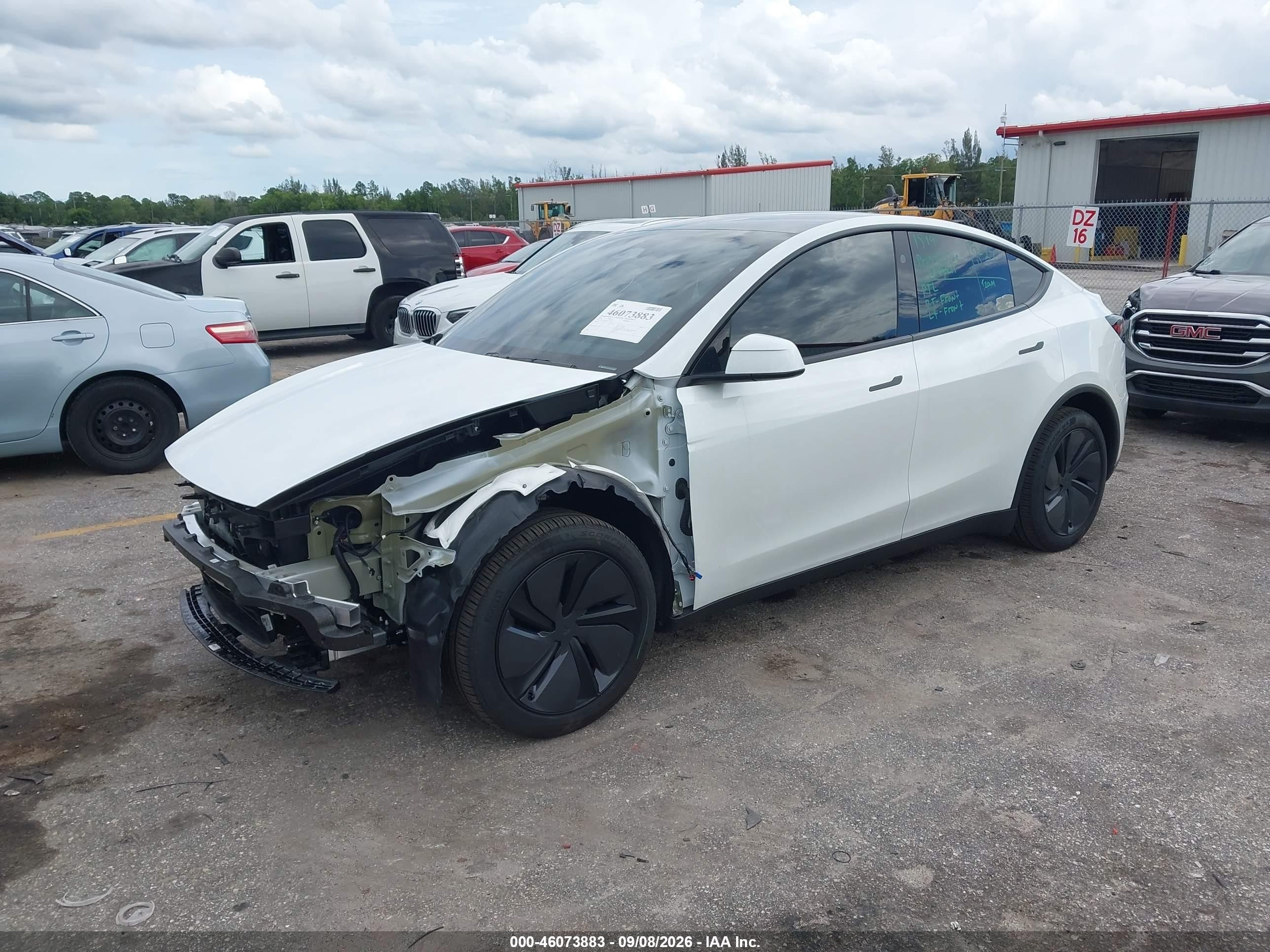2026 Tesla Model y VIN 7SAYGDED2TA477066 IAAI salvage auction — Front End, Rebuildable (Florida), sold $20,600 on 2026-10-08 (photo 2)