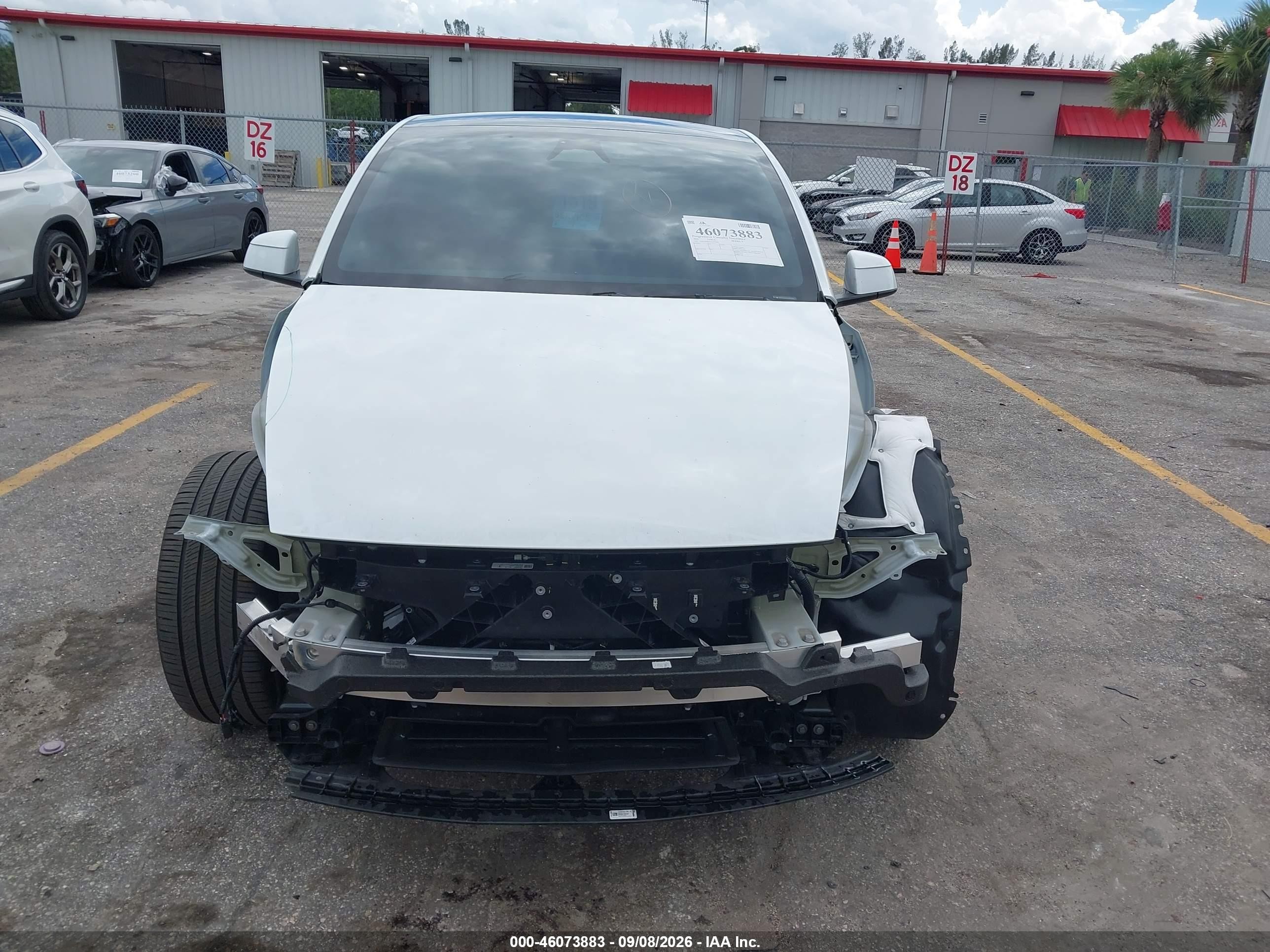 2026 Tesla Model y VIN 7SAYGDED2TA477066 IAAI salvage auction — Front End, Rebuildable (Florida), sold $20,600 on 2026-10-08 (photo 6)