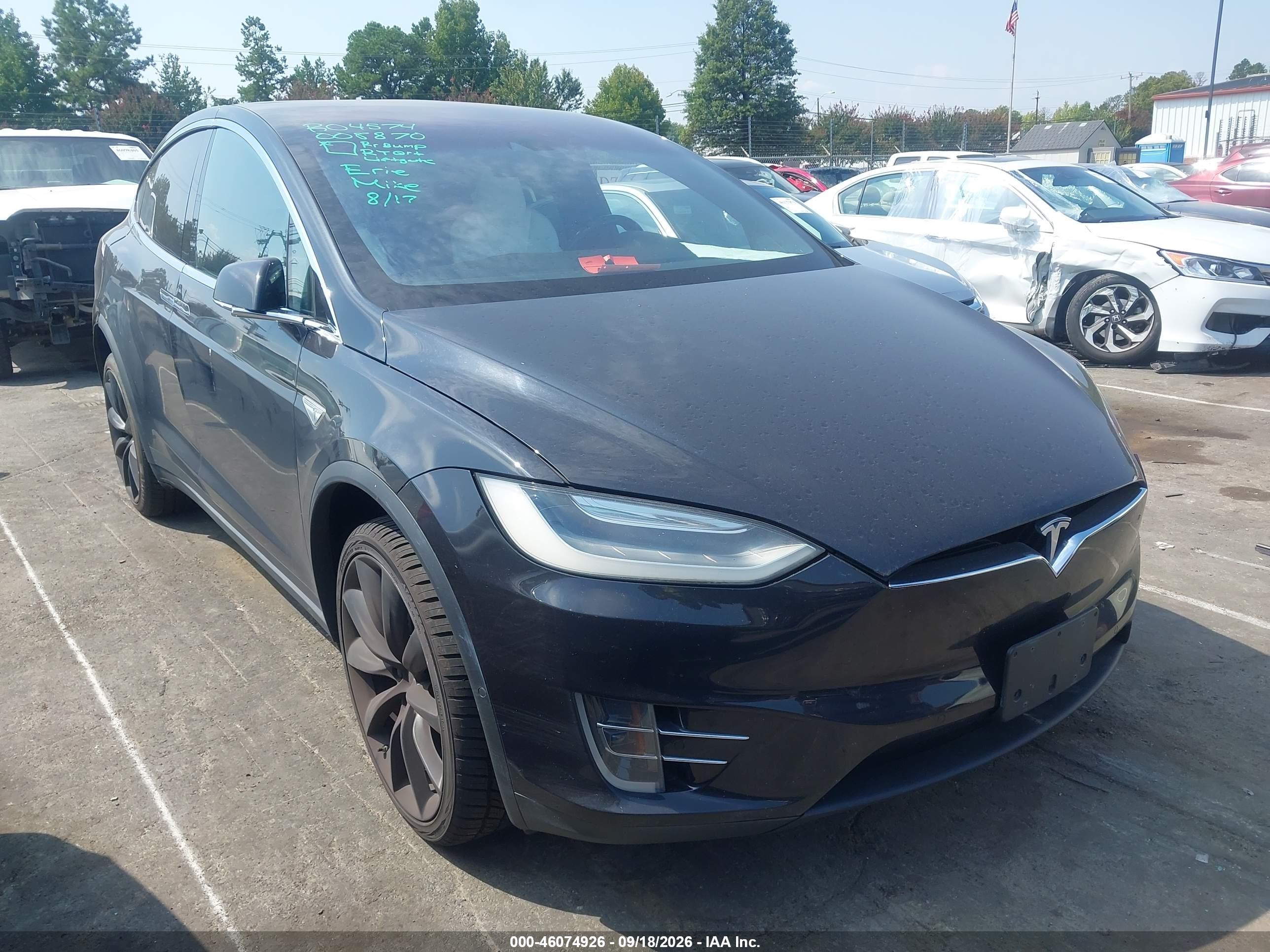 2016 Tesla Model X VIN 5YJXCAE21GF008870 — IAAI salvage auction photo